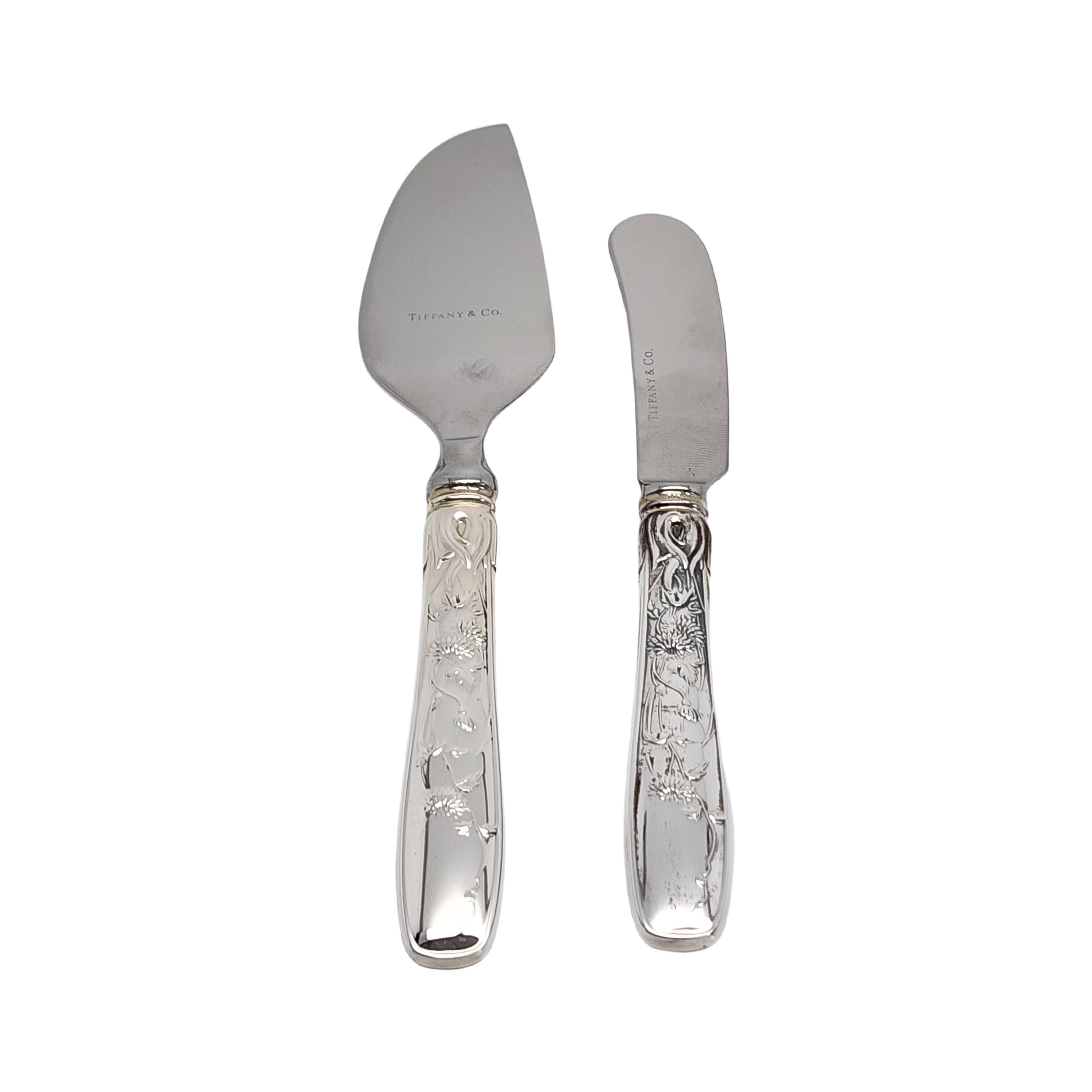 Sterling silver handle stainless blade Cheese Knife and Spreader Set by Tiffany & Co in the Audubon pattern with pouches and boxes.

No monogram

Designed by Edward C. Moore in 1871, the Audubon pattern was inspired by Japanese bird paintings of the