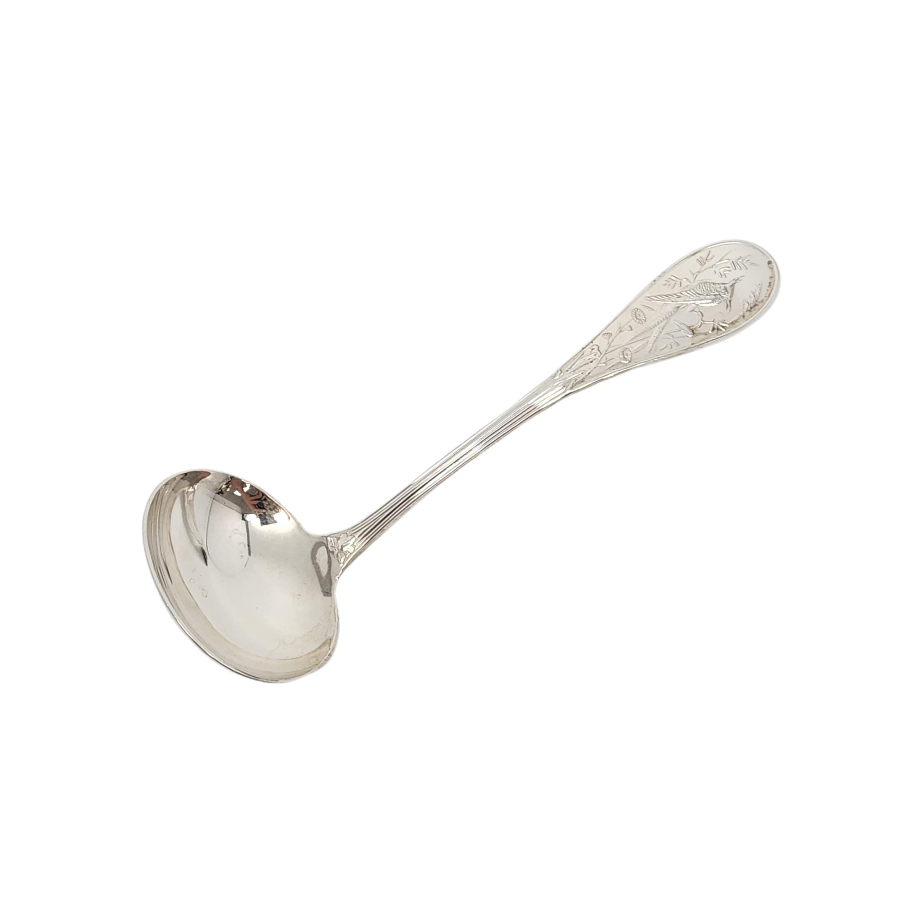 Sterling silver gravy ladle by Tiffany & Co in the Audubon pattern with pouch.

No monogram

Designed by Edward C. Moore in 1871, the Audubon pattern was inspired by Japanese bird paintings of the 19th century. This ladle features a larger oval