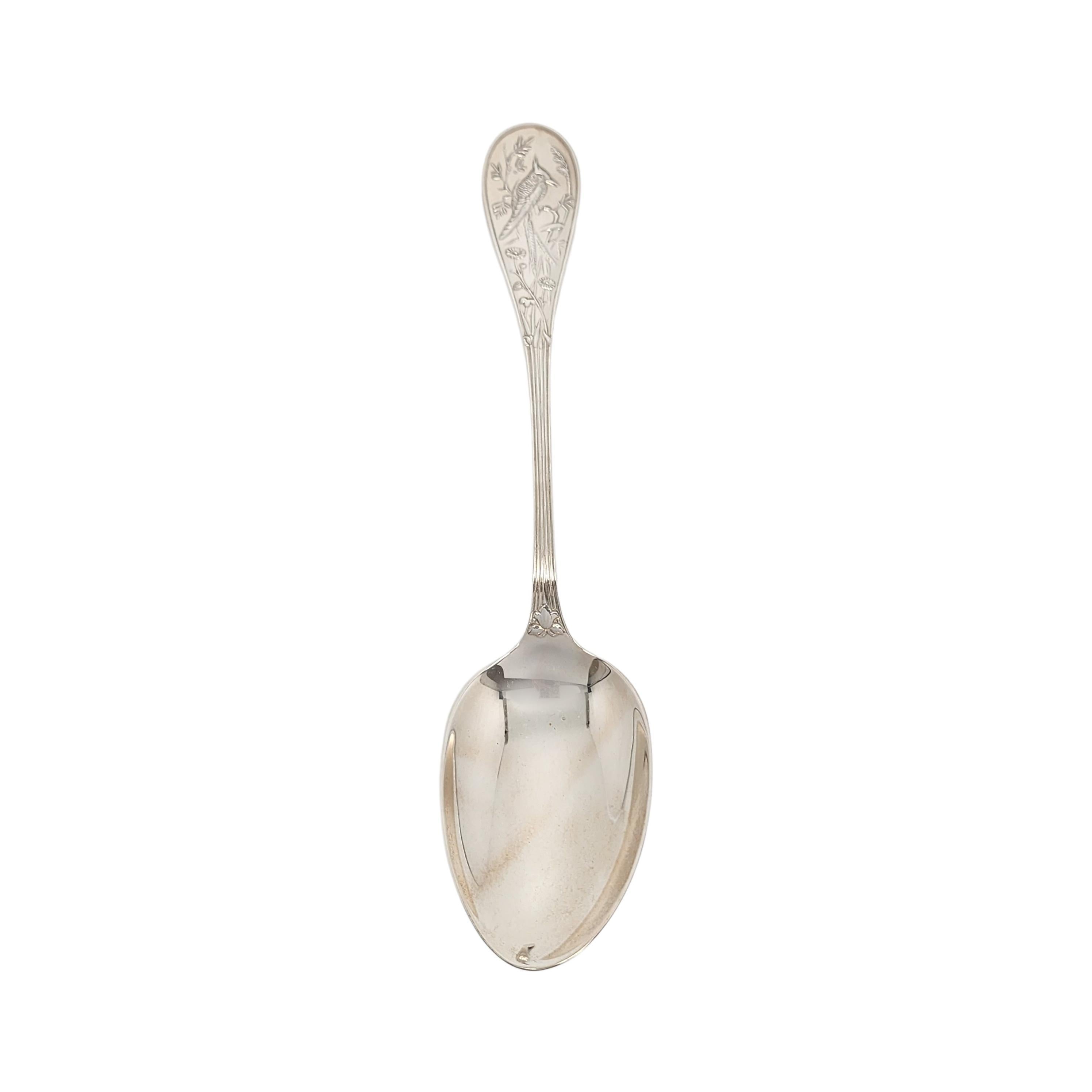 Sterling silver serving tablespoon by Tiffany & Co in the Audubon pattern with pouch.

No monogram

Designed by Edward C. Moore in 1871, the Audubon pattern was inspired by Japanese bird paintings of the 19th century. This spoon is large and