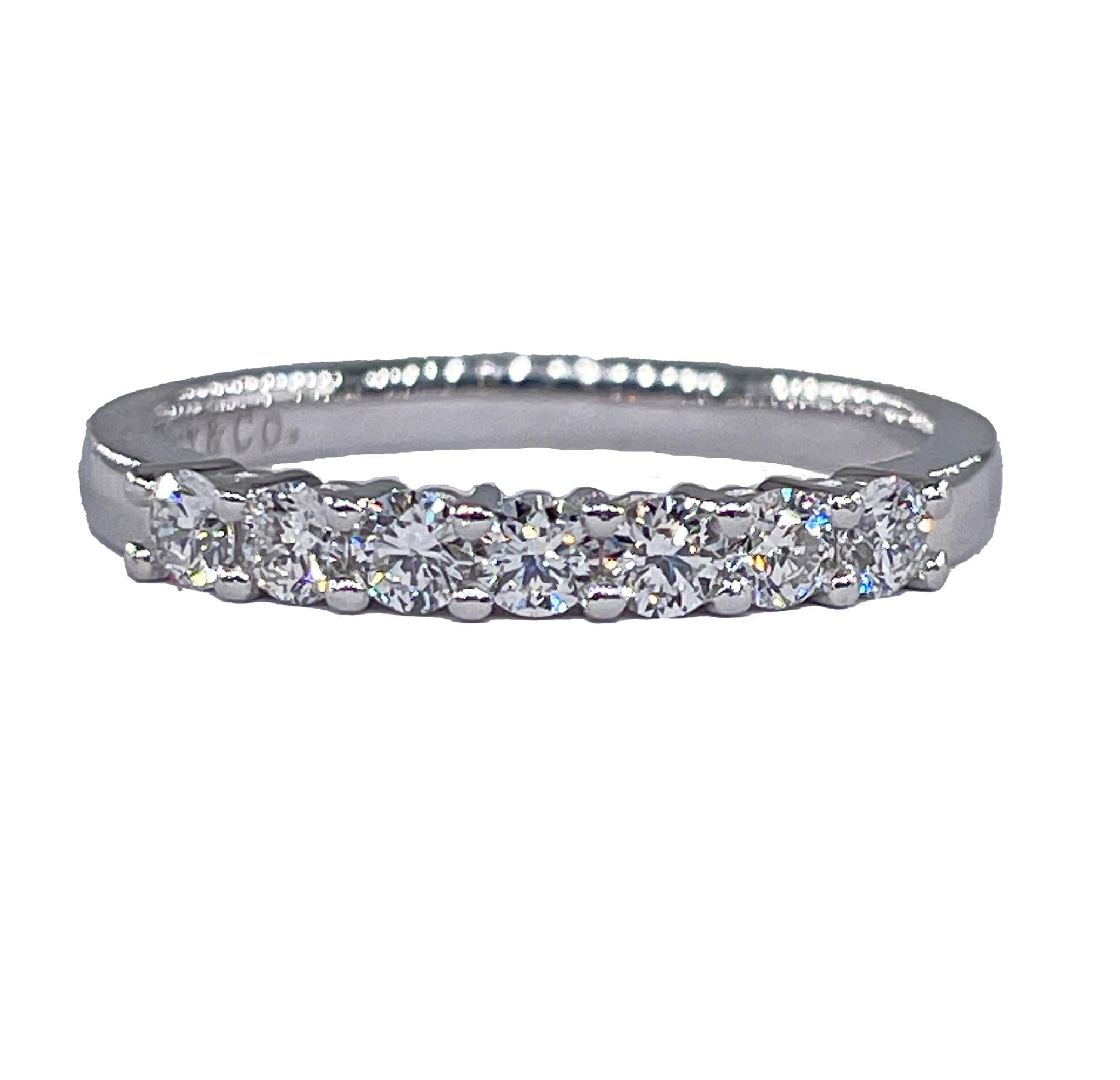 Tiffany & Co. Embraced FOREVER Half Circle Diamond Platinum Band Ring.
TIFFANY & Co - The most famous Brand in the World! The perfect Gift for any Women.
From our Estate Vintage Collection. 
A Gorgeous and Elegant Iconic Tiffany & Co. Embrace