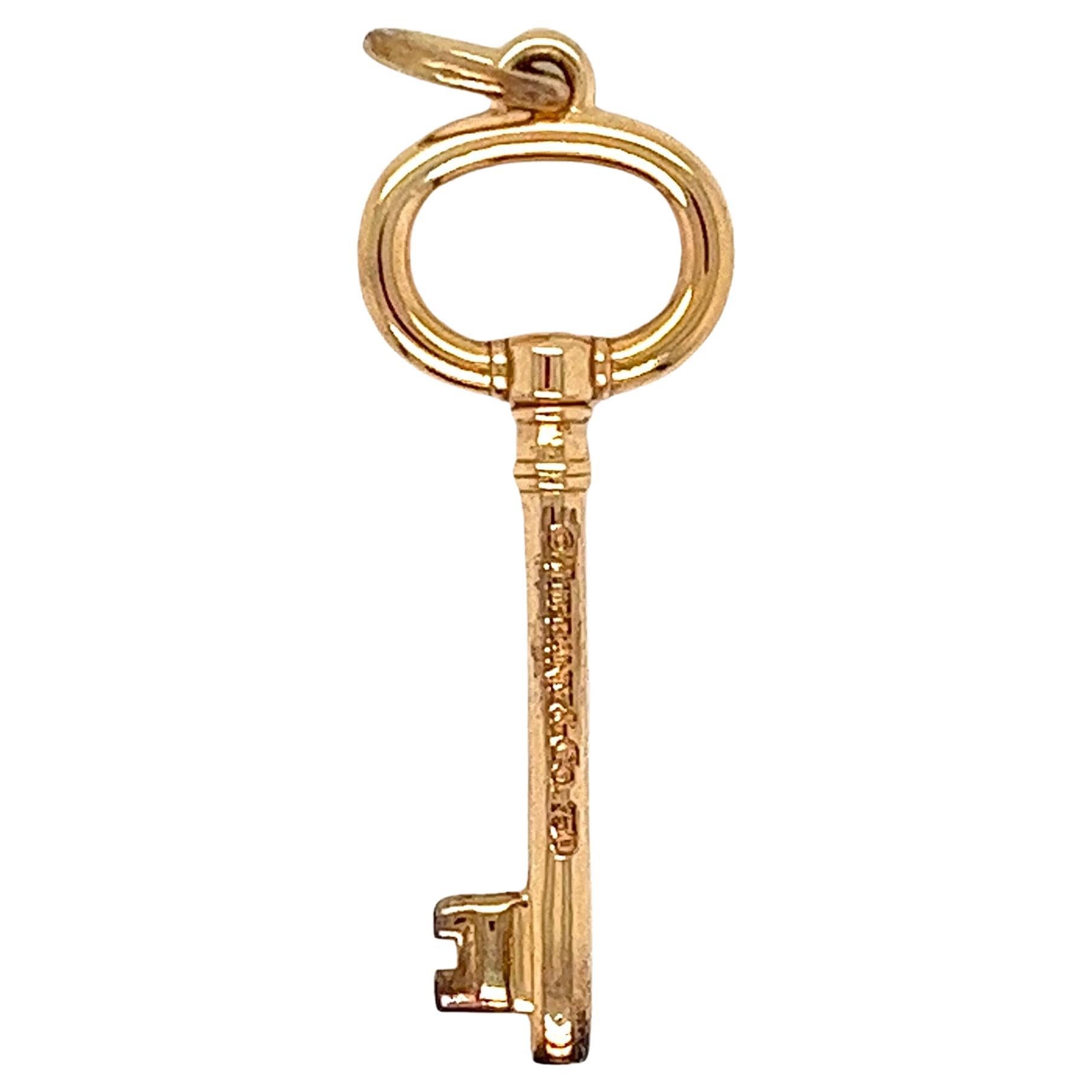 Tiffany & Co. Pendentif authentique à clé ronde ouverte en or rose 18 carats
