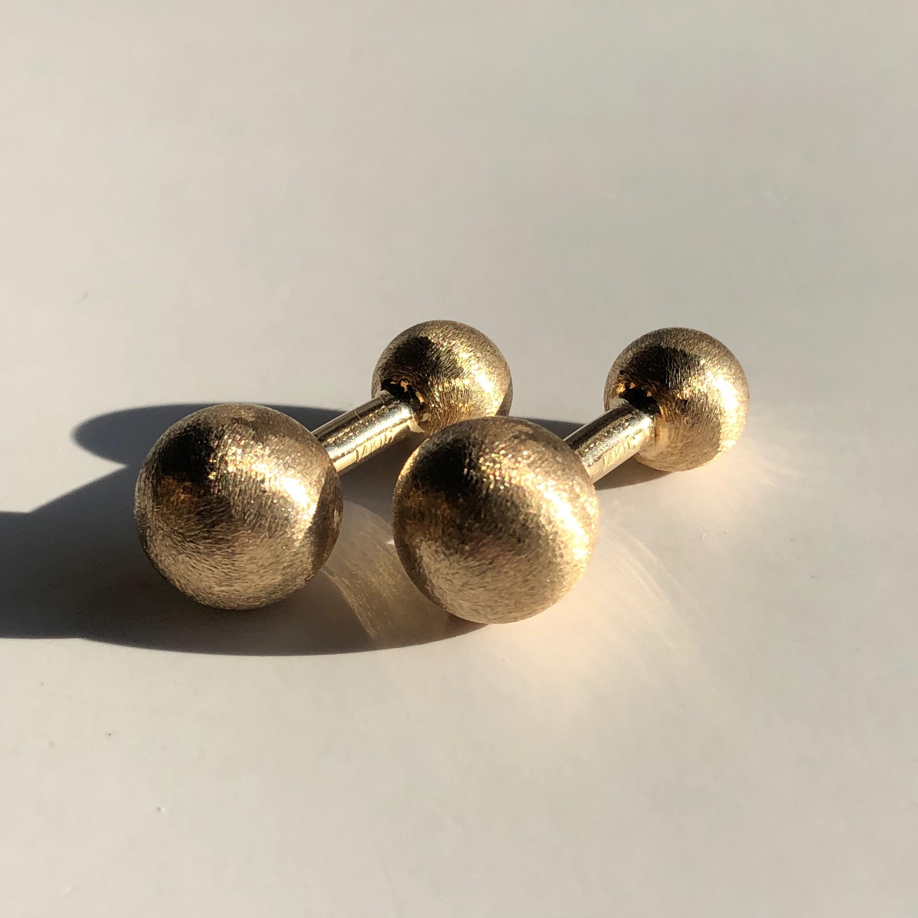 A Pair of Genuine Tiffany & Co Barbell Cufflinks in 14K Yellow Gold 

In brushed gold with polished gold bar

Very smart and wearable easy to use with the rigid bar

An Outstanding buy as to purchase these today in Tiffanys would be in the Thousands