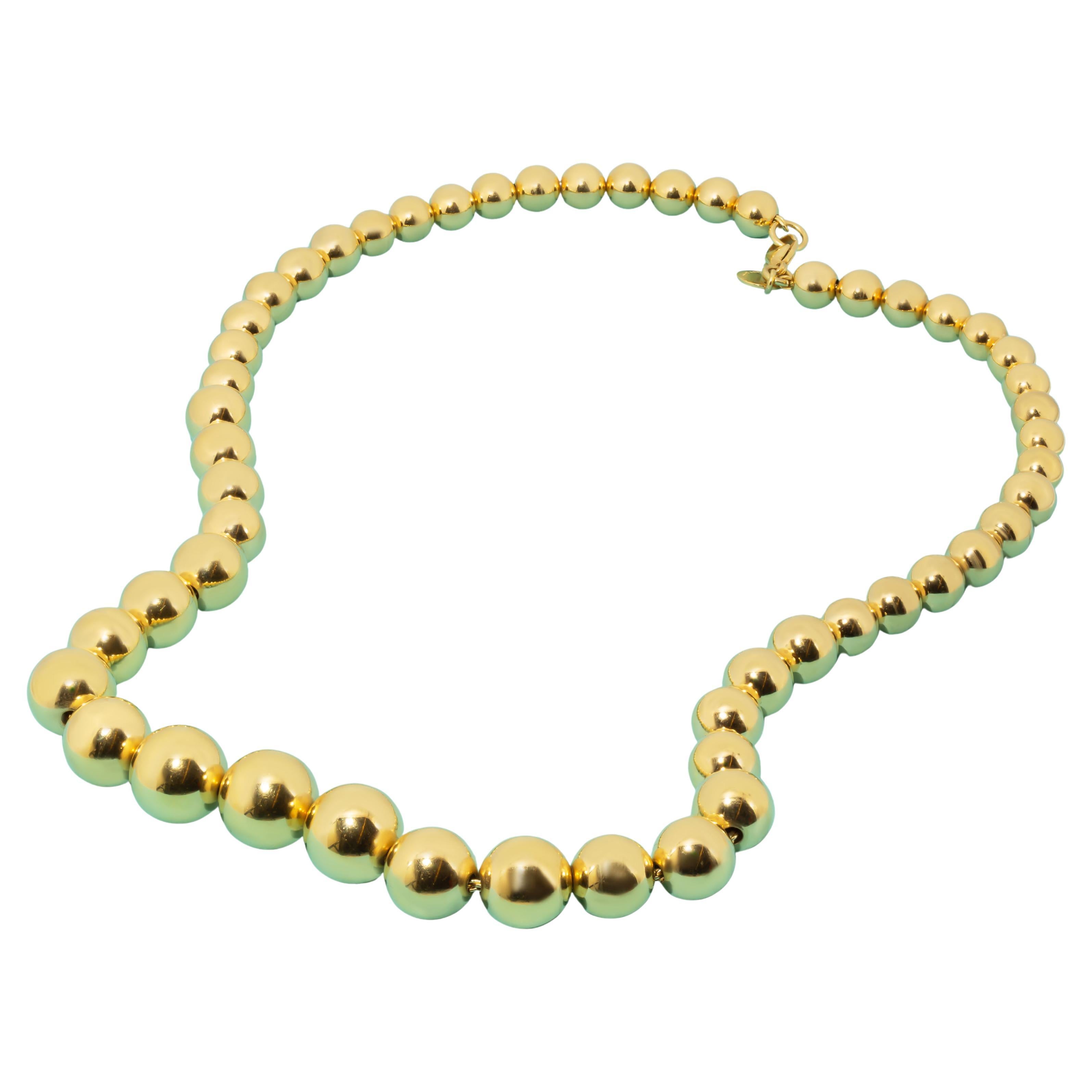 Authentic Tiffany 18k Yellow Gold Graduated Bead necklace
With original box  
41.5 Grams of gold
Length: 16”

