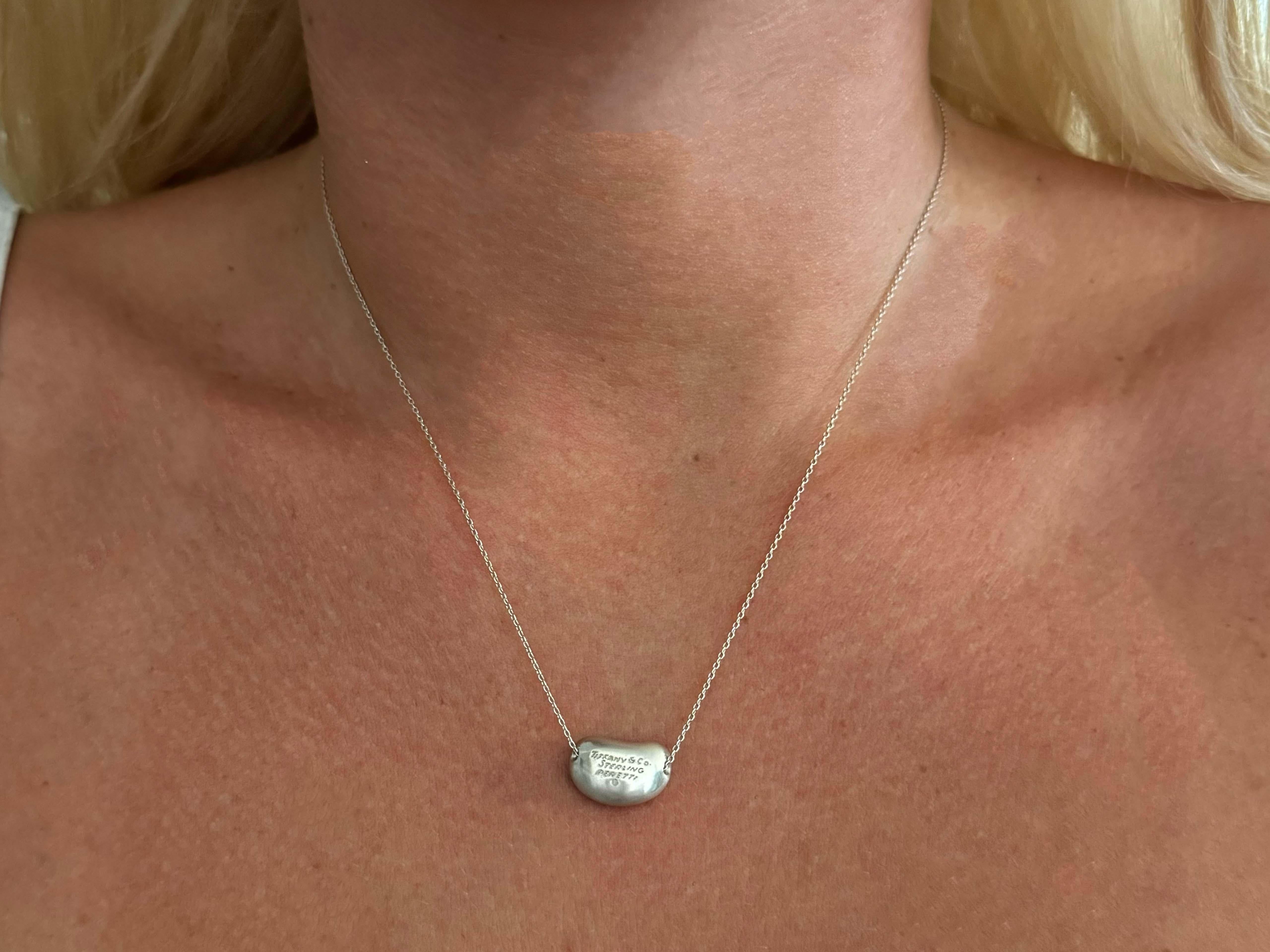 Necklace Specifications:

Brand: Tiffany & Co.

Metal: Sterling Silver, AG 925

Pendant Measurements: ~16mm x 10 mm

Chain Length: 18