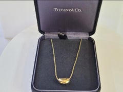 Tiffany & Co. Bean Pendant In 18k Yellow Gold 14mm Wide