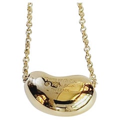 Tiffany & Co. Bean Pendant In 18k Yellow Gold 14mm Wide