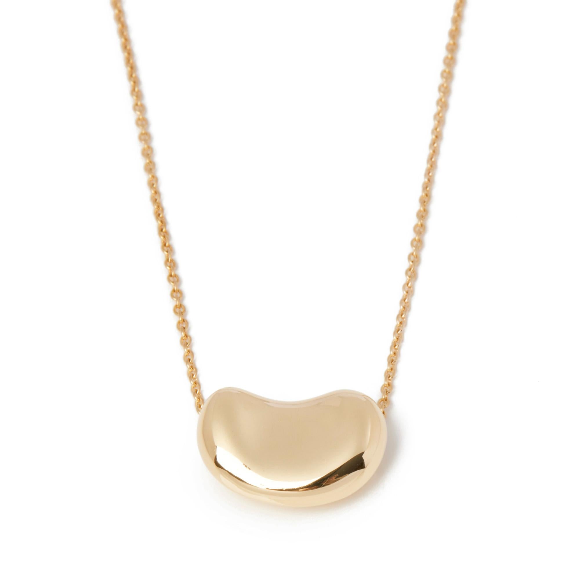This pendant by Tiffany & Co is from their Elsa Peretti collection and features an 15mm 18ct yellow gold bean set on a 42cm trace chain. Accompanied by a Xupes presentation box. Our Xupes reference is J875 should you need to quote this.

ITEM