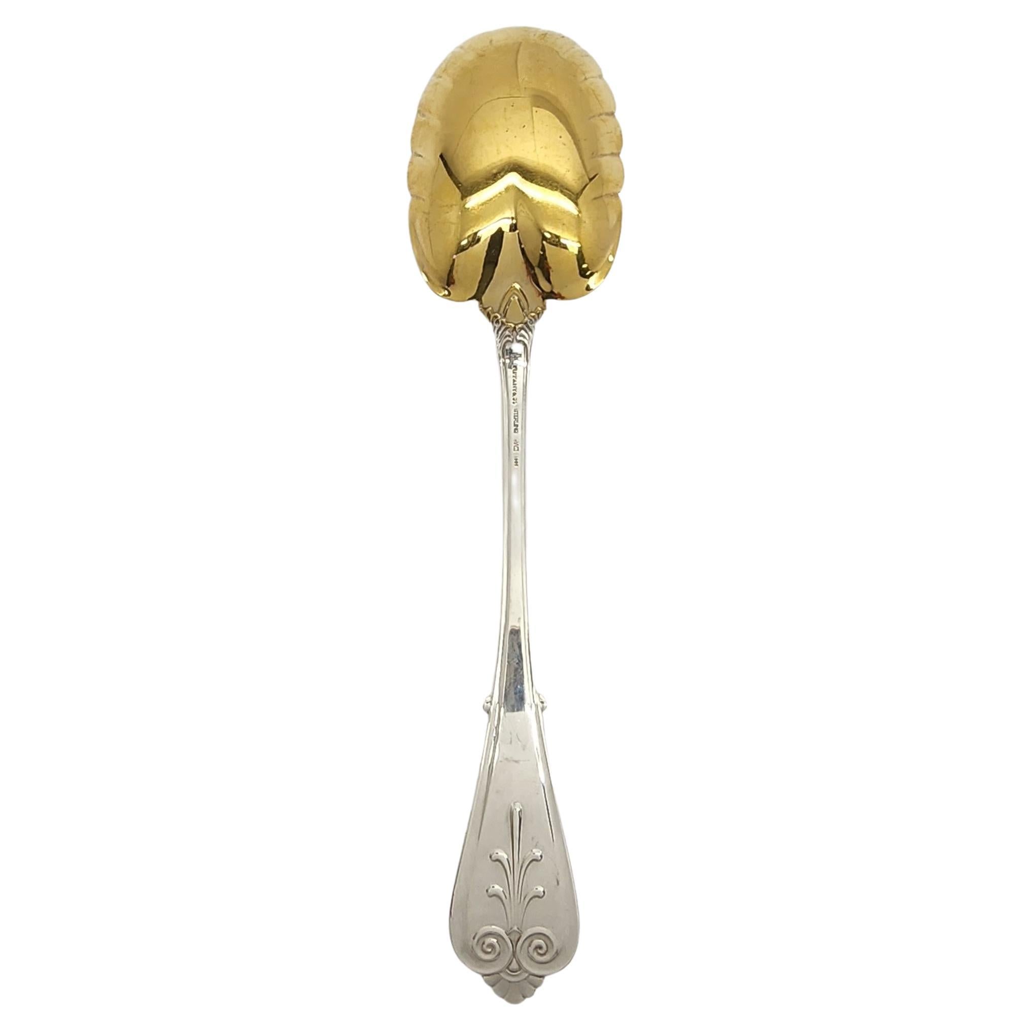Tiffany & Co sterling silver gold wash bowl berry serving spoon in the Beekman 1869 pattern by Tiffany & Co.

Monogram appears to be EPM

Beautifully simple scroll design was designed in 1869 by Edward Moore. Features a gold washed leaf shape bowl.