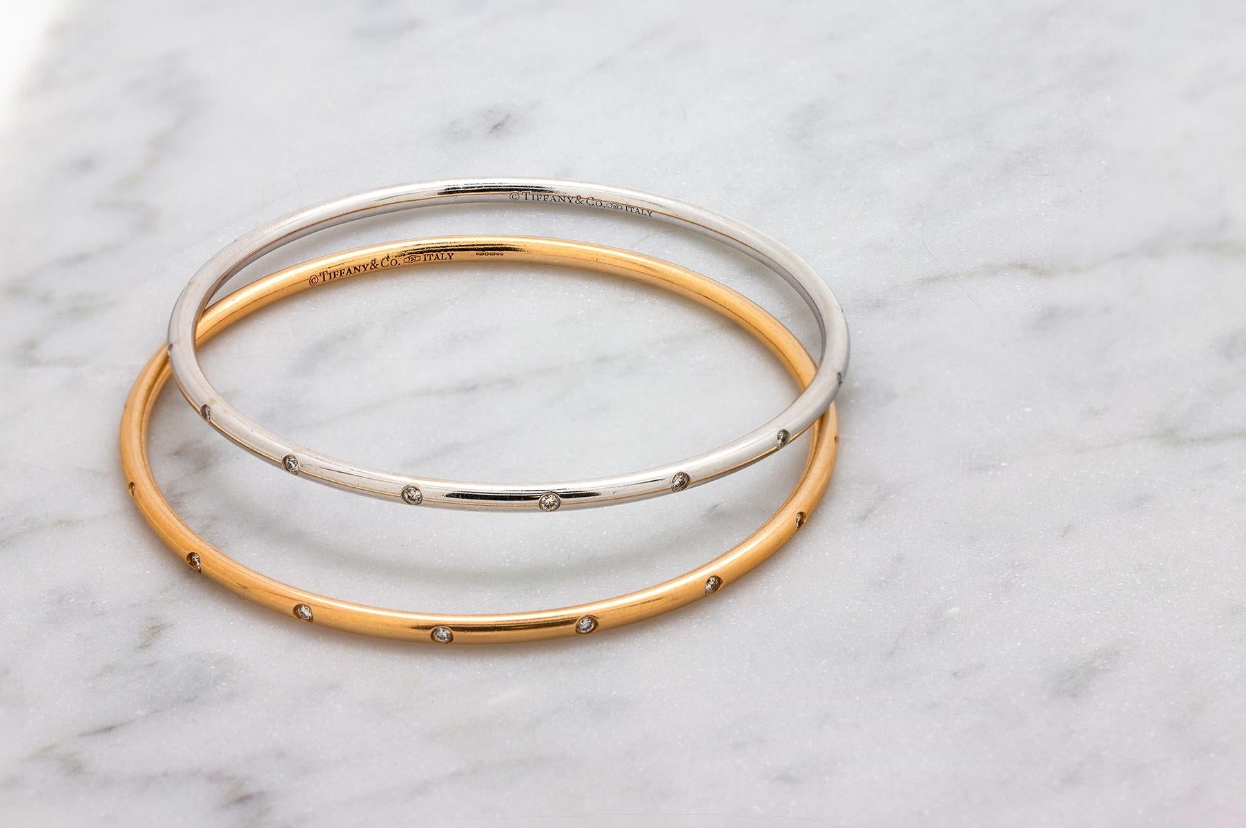 Classic, versatile 3mm Tiffany & Co. Bezet bangle bracelet in 18k rose gold with 16 flush-set full-cut round brilliant diamonds, total weigh approximately 0.48ct, F-G/VS. This stunning bracelet is great for stacking or wearing solo, with jeans or a