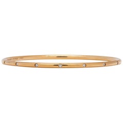 Tiffany & Co. Bezet 18 Karat Rose Gold Diamond Bangle Bracelet, circa 2000s