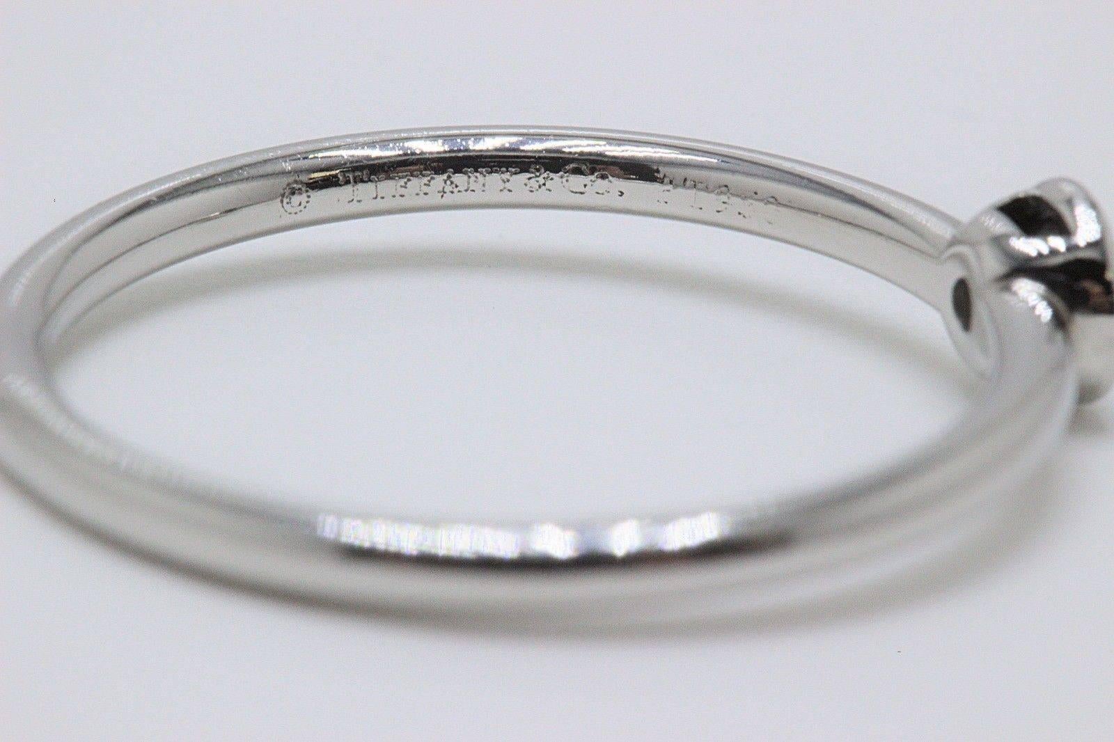 Tiffany & Co.
Style:  Bezet Bezel Set Solitaire Ring
Metal:  Platinum PT950
Size:  6.75 - sizable
Total Carat Weight:  0.16 TCW
Diamond Shape:  Round Brilliant 
Diamond Color & Clarity:  E / VVS1
Hallmark:  ©TIFFANY&Co.PT950
Includes:  Tiffany & Co