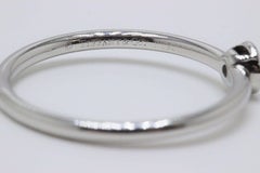 Tiffany & Co. Bezet Round Brilliant Diamond and Platinum Ring