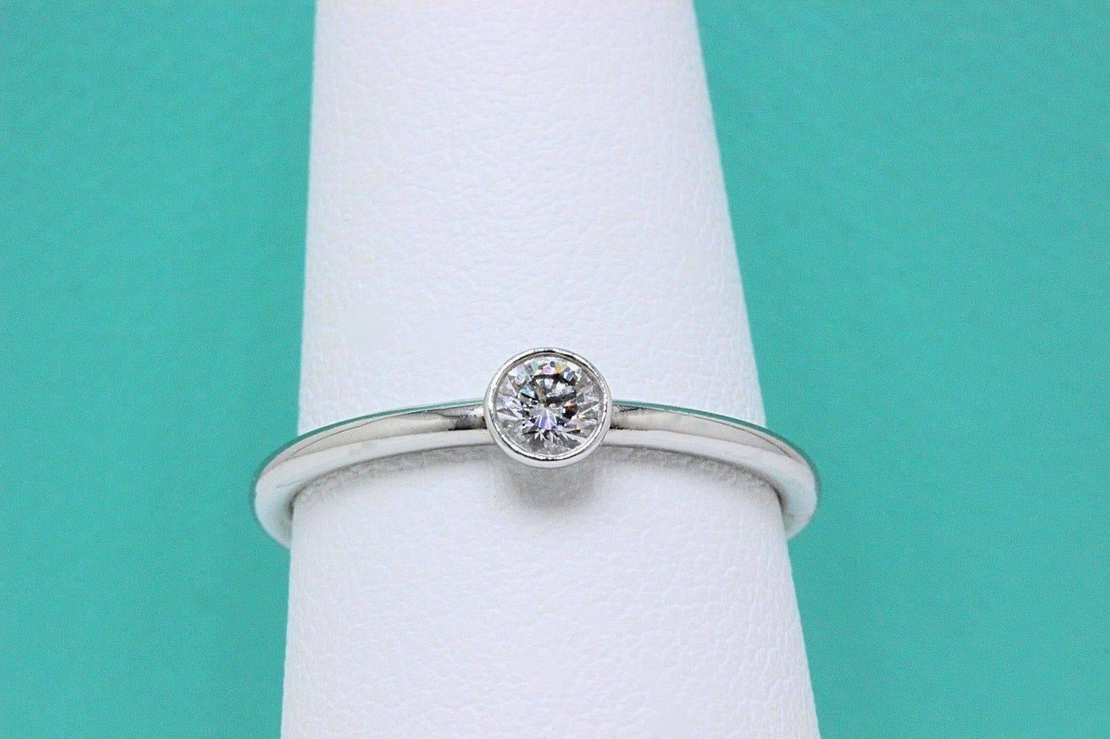 Round Cut Tiffany & Co. Bezet Round Brilliant Diamond and Platinum Ring