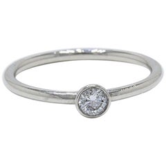 Tiffany & Co. Bezet Round Brilliant Diamond and Platinum Ring