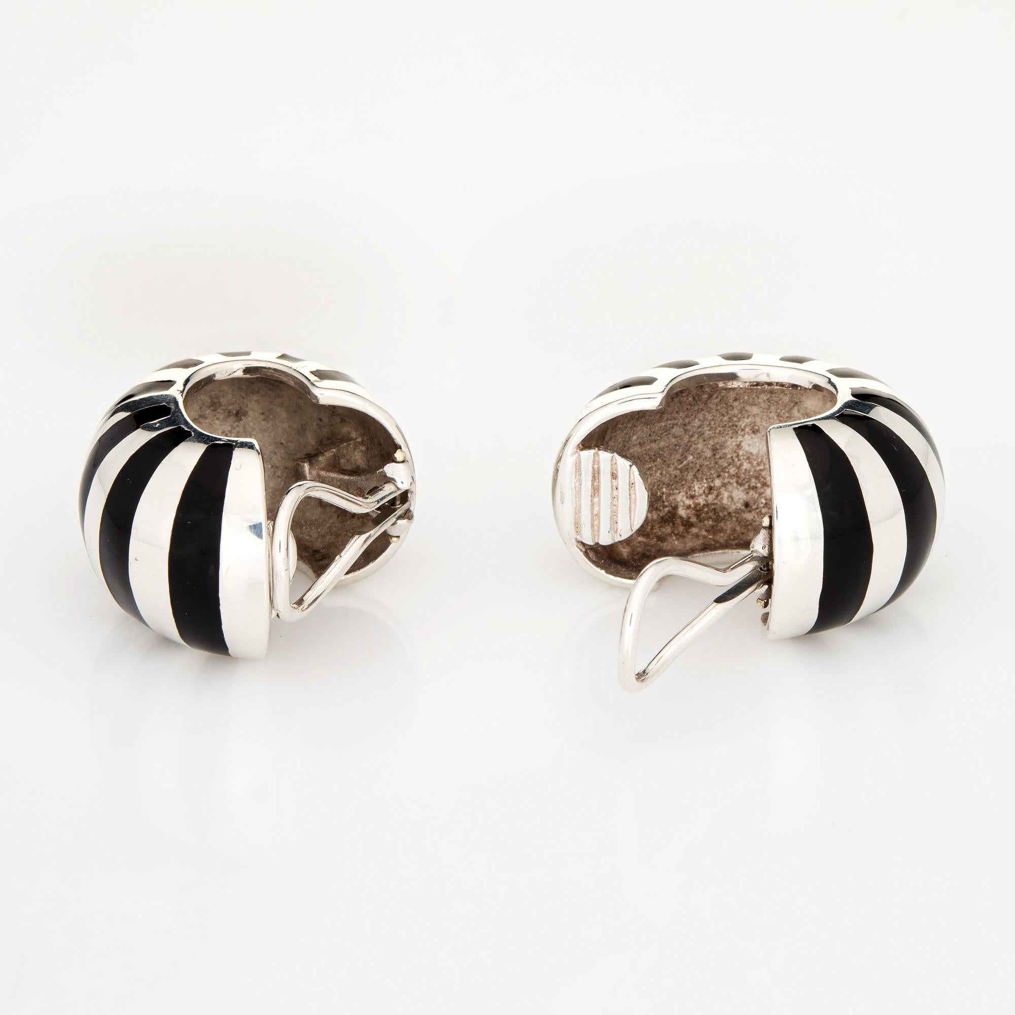 Elegant pair of vintage Tiffany & Co earrings (circa 1980s) crafted in sterling silver. 

The vintage 1980s earrings feature a black enamel stripe design. A great collector piece today (and also a very wearable pair of earrings!) The earrings are