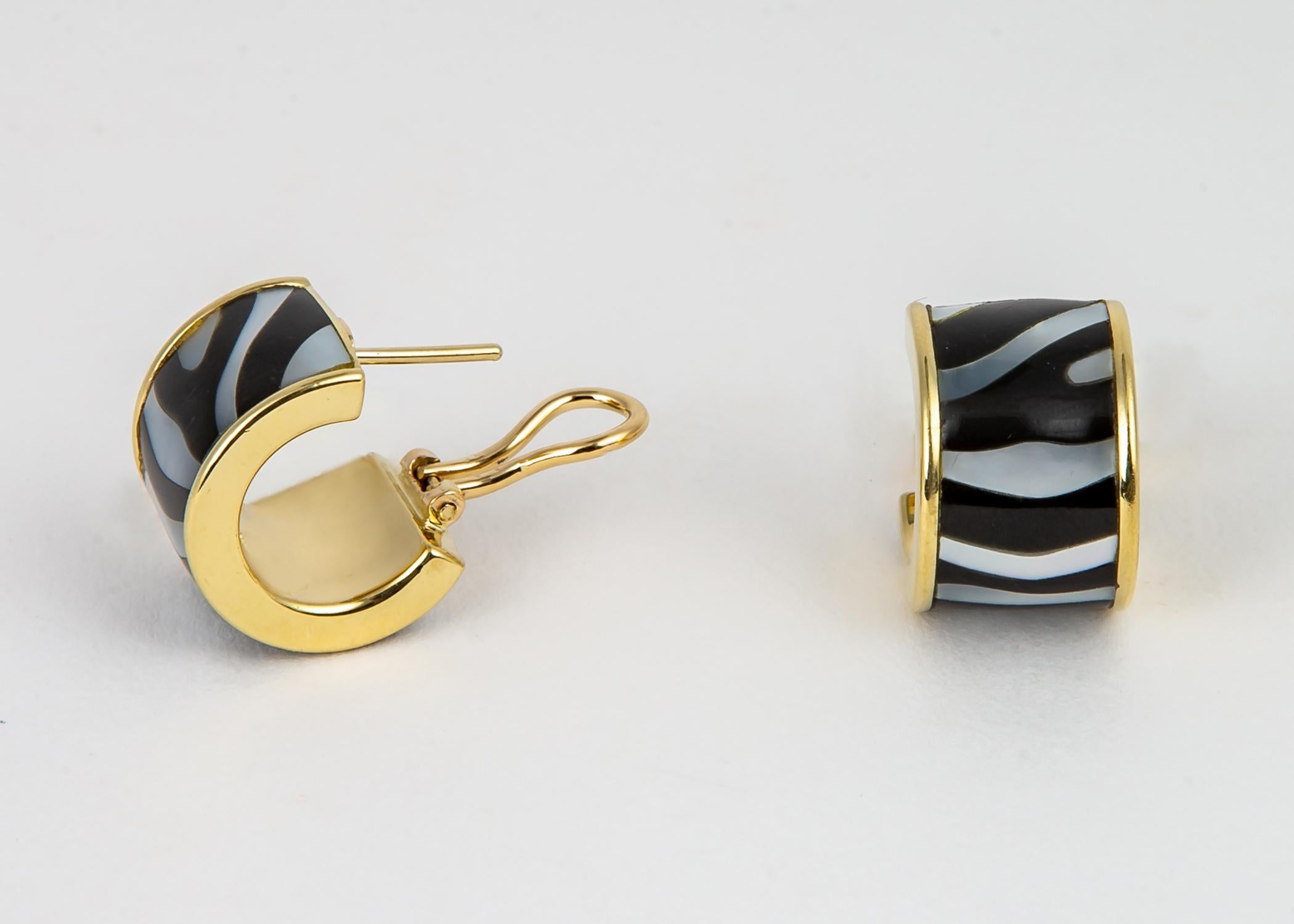 Simply Chic!!! Tiffany & Co. combines black jade and mother of pearl to create this playful zebra stripe earring. Just under 3/4's of an inch by 1/2 an inch in size. 