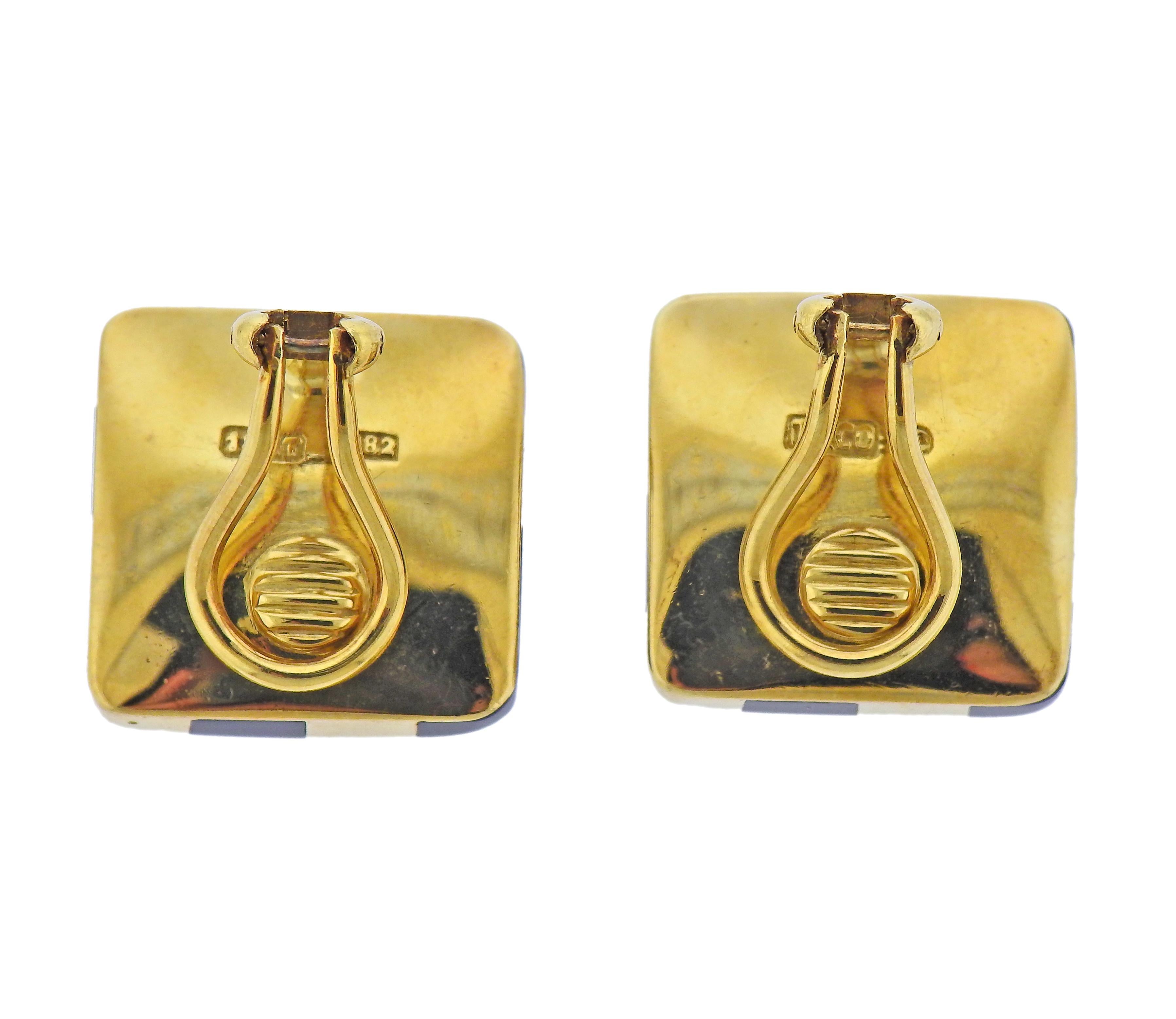 Pair of 18k yellow gold earrings with inlayed black jade, one small dent in the gold, visible upon very close inspection. Earrings are 20mm x 20mm. Marked: T & Co, 18kt, 1882. Weight - 17.5 grams. 