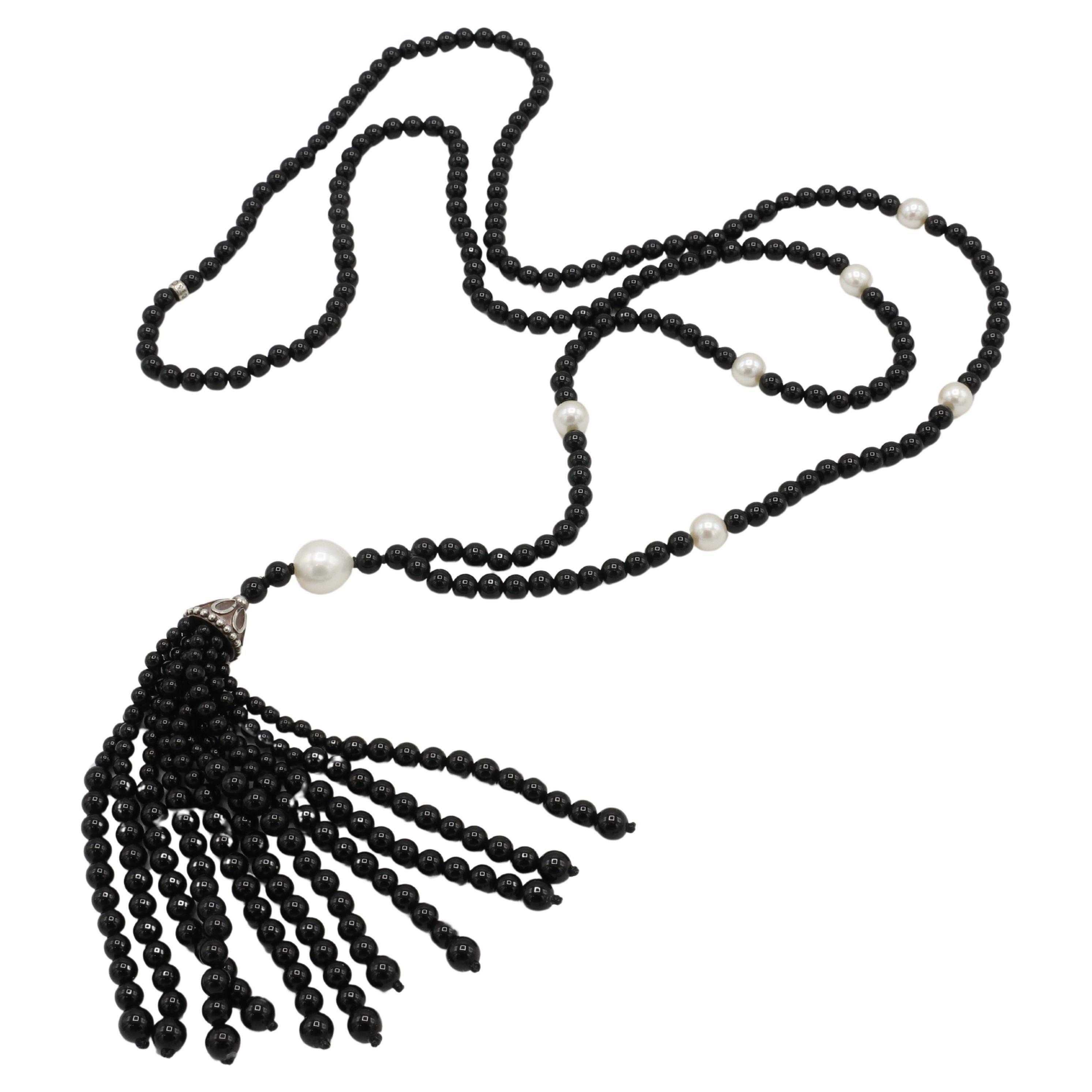 Tiffany & Co Blake Onyx & Pearl Tassel Pendant Drop Necklace
Metal: Sterling silver 
Weight: 42.7 grams
Onyx: 2.5 - 4.5mm beads
Pearls: 6-9mm
Drop: 4.5 inches
Length: 35 inches
Signed: ©T&Co. AG925
