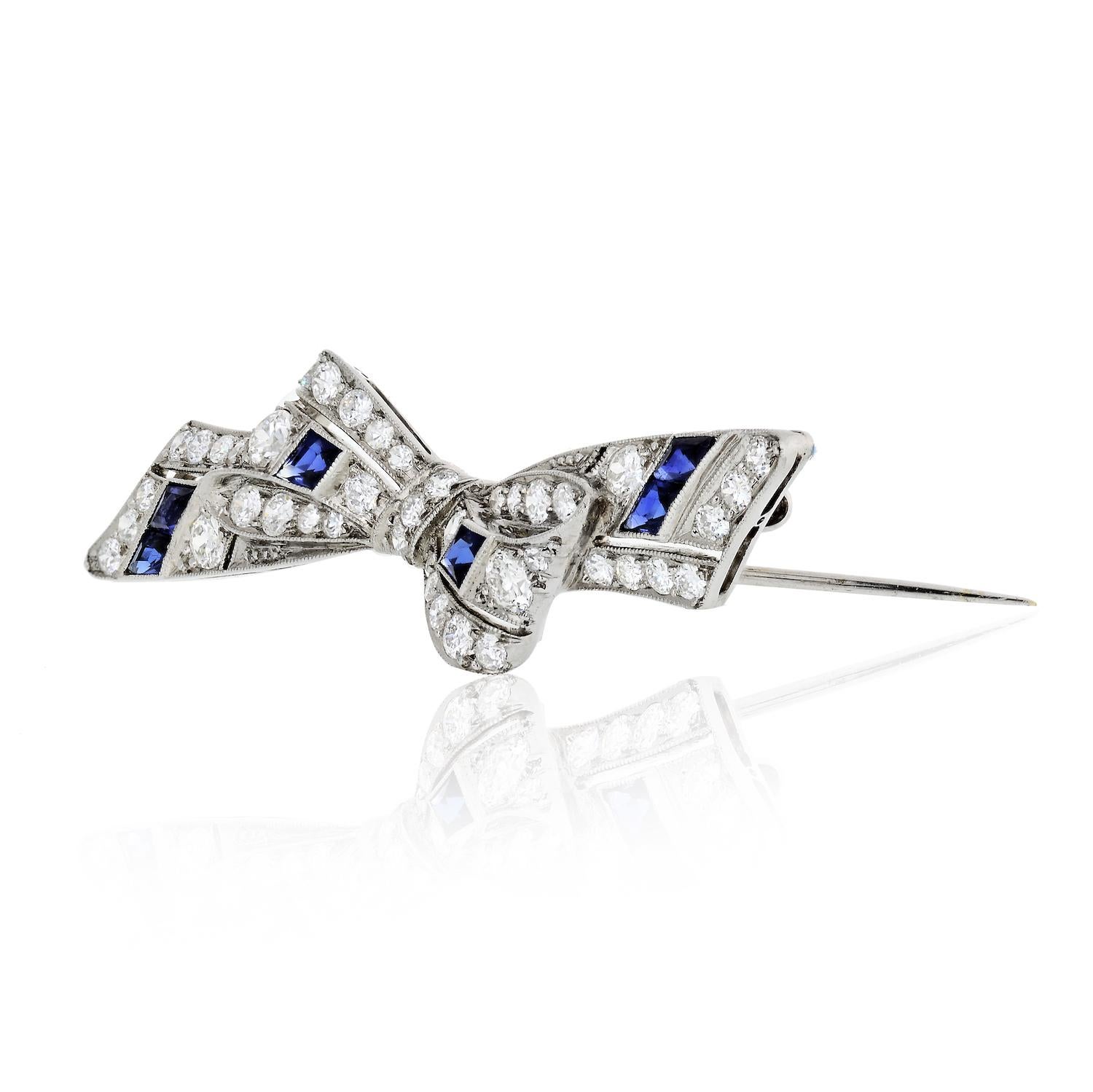 Vintage Tiffany & Co Platinum Sapphire Diamond Bow Pin

The realistic bow of pierced design, set throughout with single and full-cut diamonds, and french cut sapphires in millegrain detailed platinum.

Measurements:
Length: 5cm
Width: 1cm
Gram