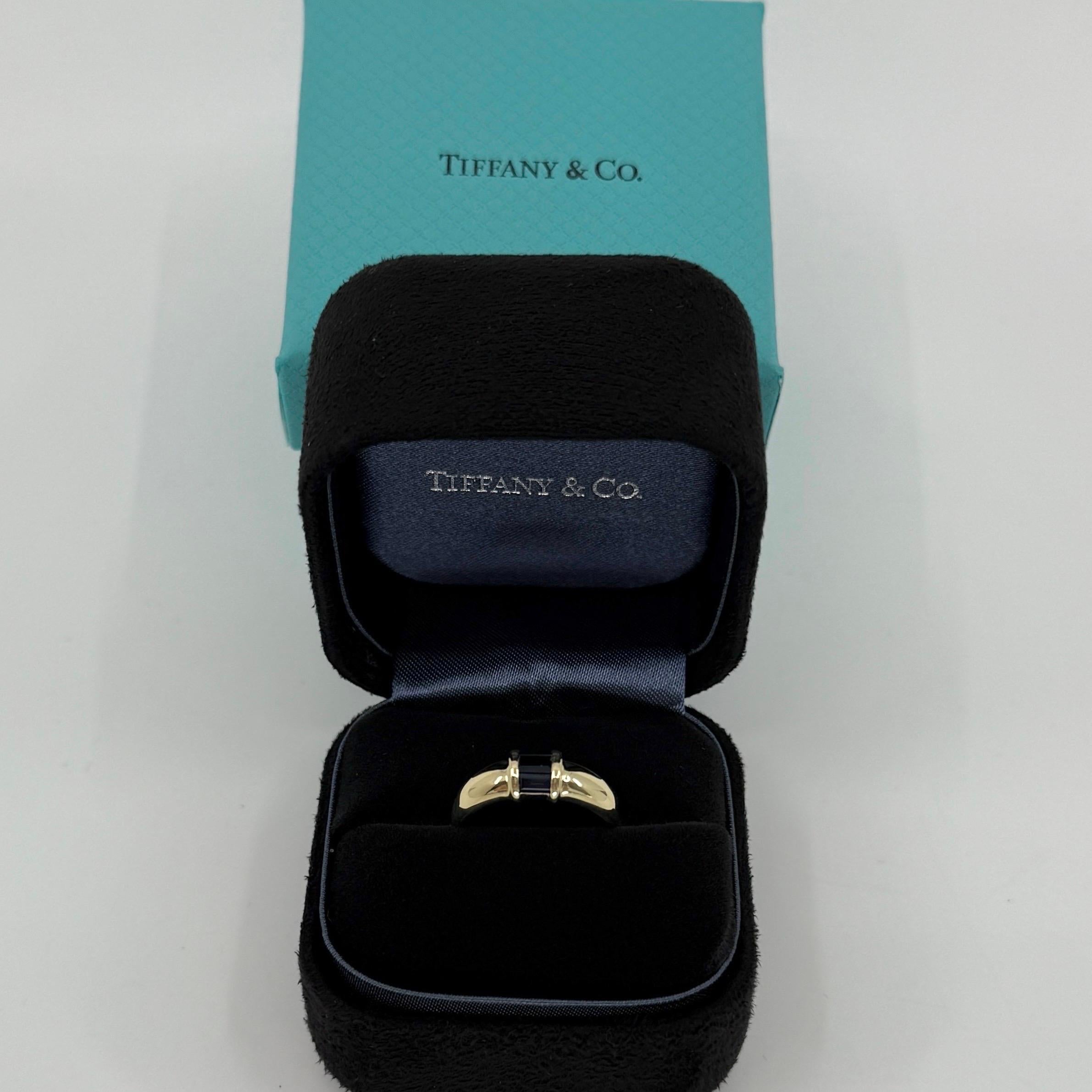Vintage Tiffany & Co. 18k Yellow Gold Baguette Cut Deep Blue Sapphire Three Stone Band Ring.

A beautifully made yellow gold ring set with three deep blue baguette cut sapphire. Superb colour, clarity and cut. Perfectly matched, measuring approx.