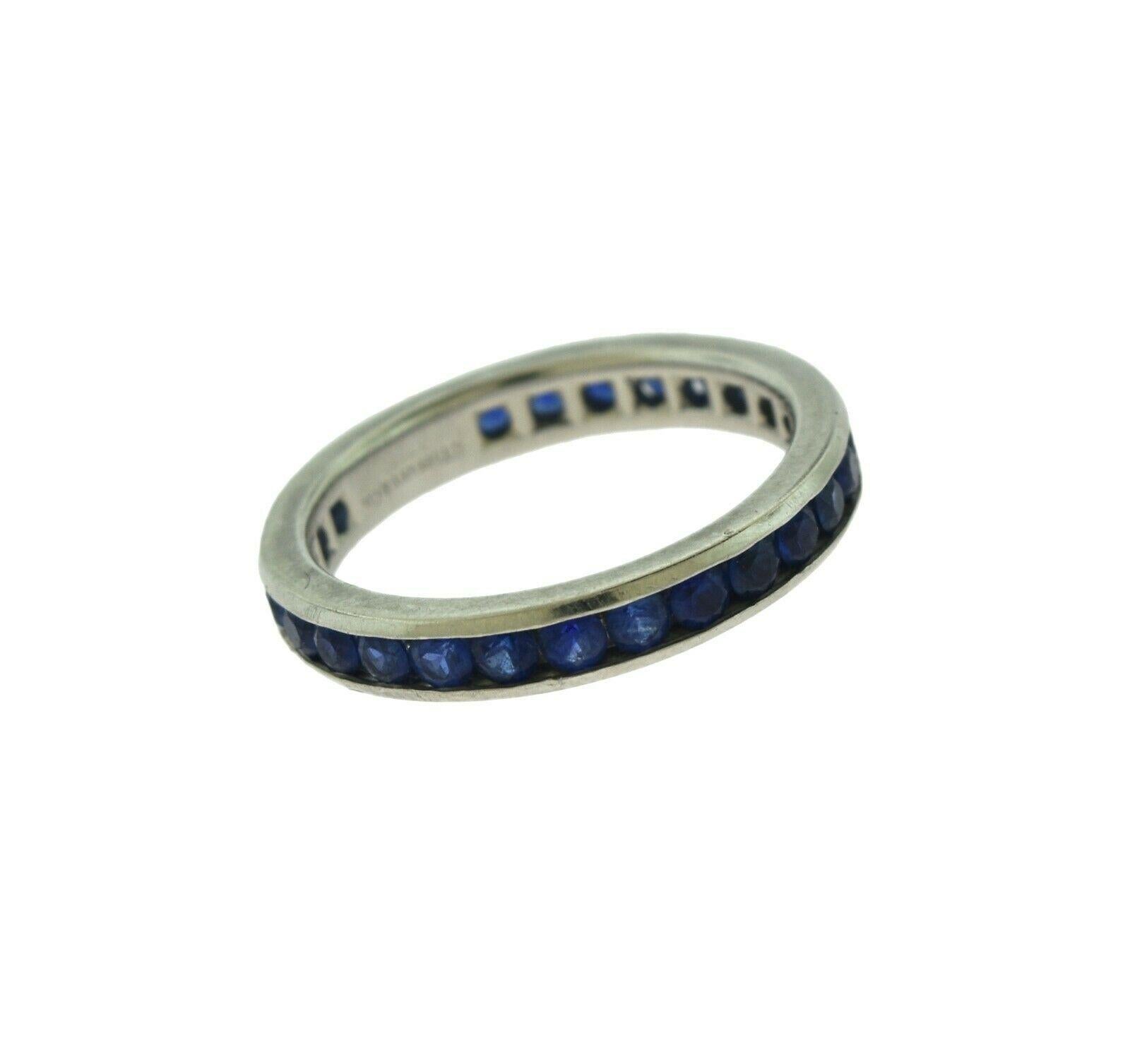 Designer: Tiffany & Co.

Style: Eternity Band

Metal: Platinum 

Metal Purity: 950 ​​

Stone:  Blue Sapphire

Ring Size: 5.5 

Band Width: 3 mm 

Total Carat  Weight :  Approx. 1.35 ct

Total Item Weight (grams):  4.75 g

Hallmarks: Tiffany & Co.;