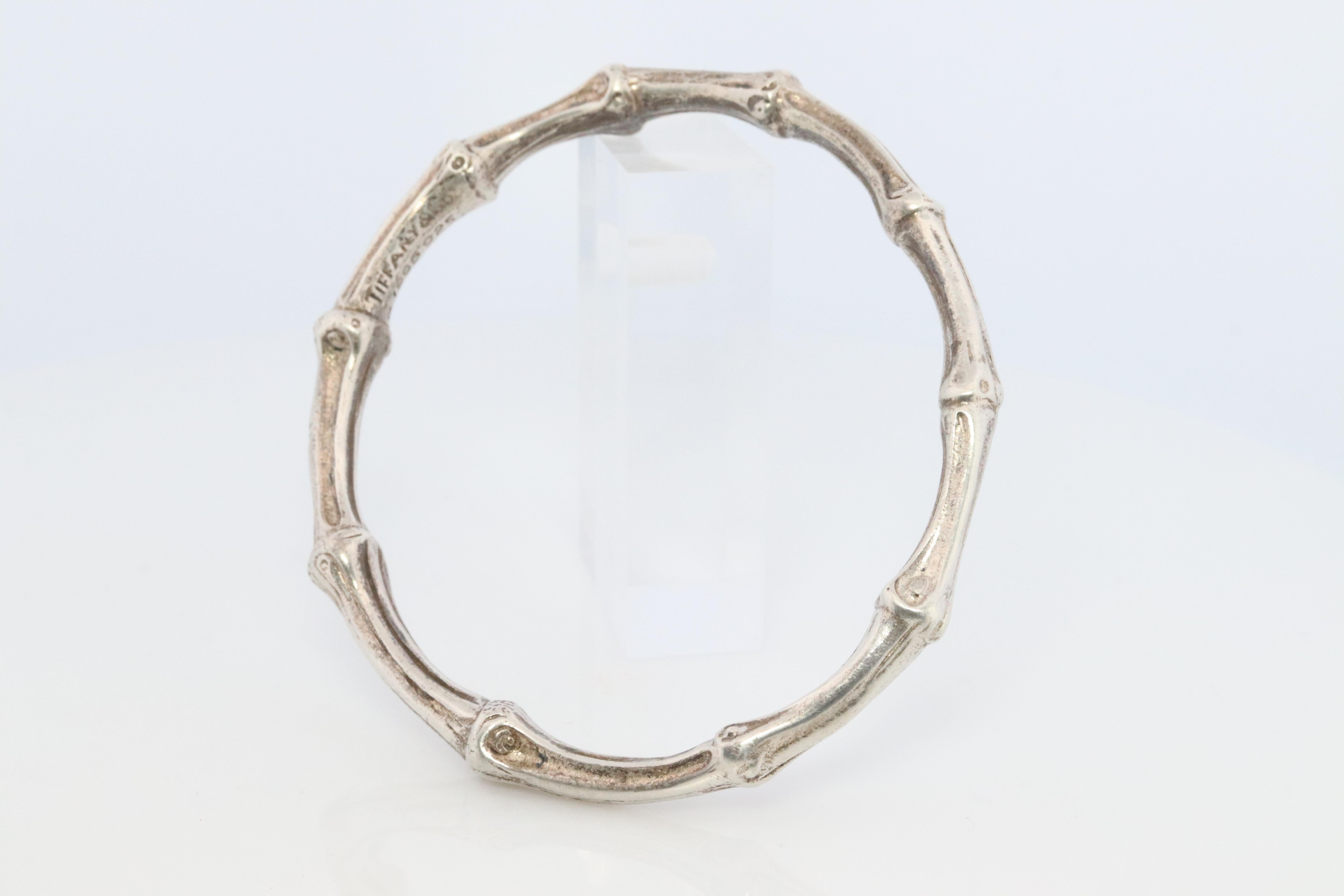 Very Rare Designer Piece. Made by Tiffany and Co. Sterling Silver Bamboo Bangle Bracelet

1996 Tiffany and Co

Condition: Shows some patina. 

Details:
42.3grams