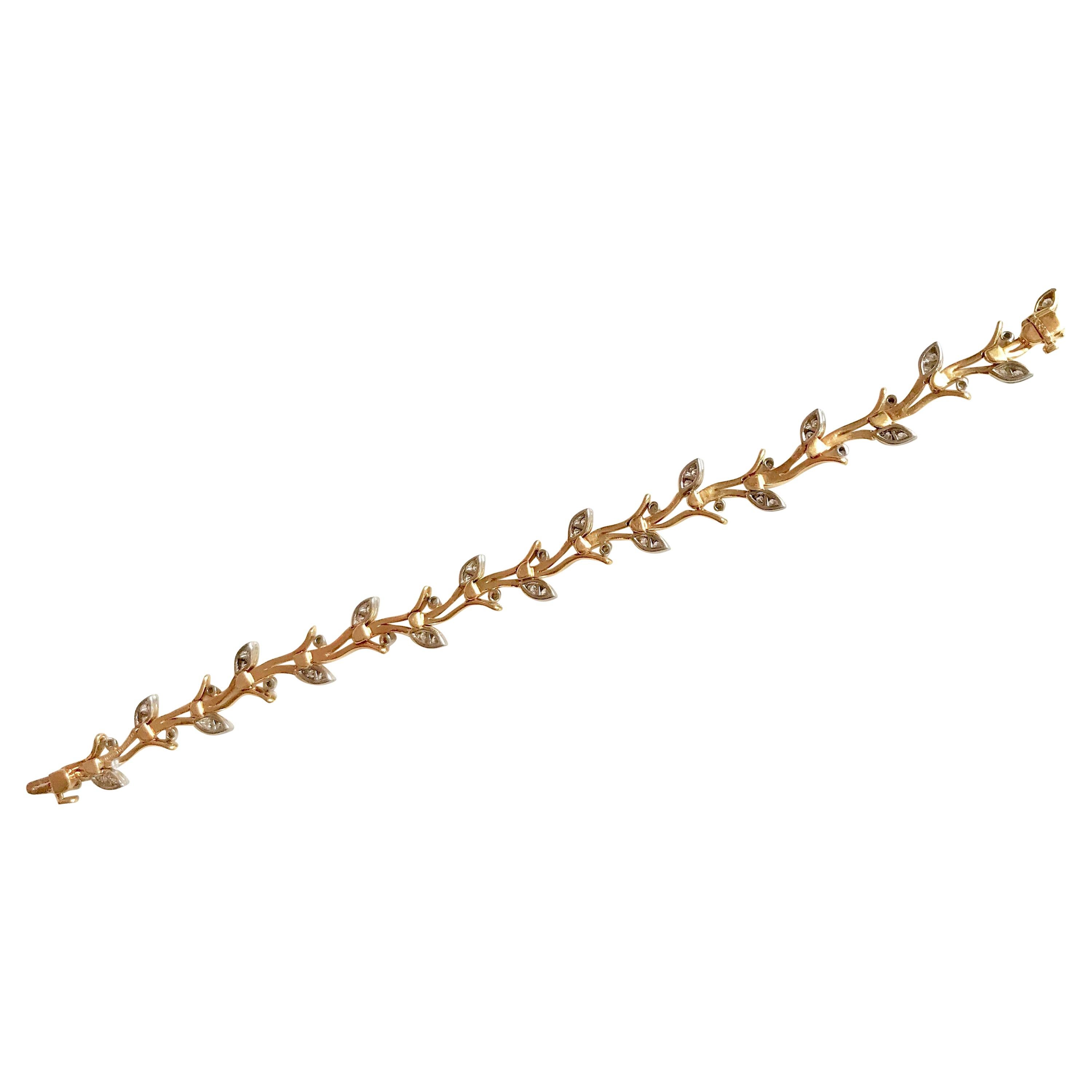 Tiffany & Co. Bracelet en forme de brindille en or jaune 18 carats, platine et diamants en vente