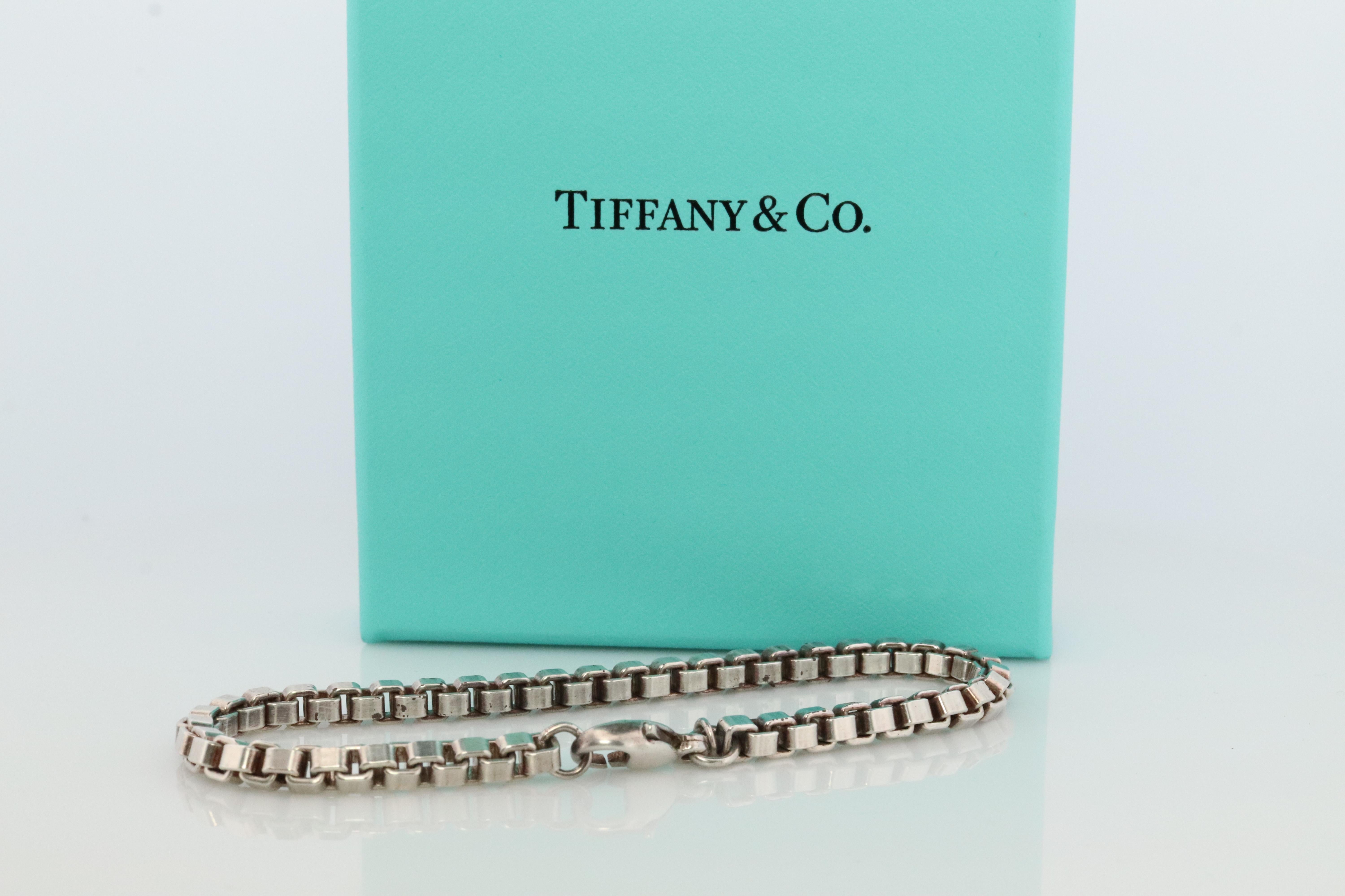 Very Rare Designer Piece. Made by Tiffany and Co. Sterling Silver Venetian Square Link Bracelet. 

Condition: Shows some patina. Comes in Tiffany Pouch.

Details:
7.5in length
17.2grams

4mm wide