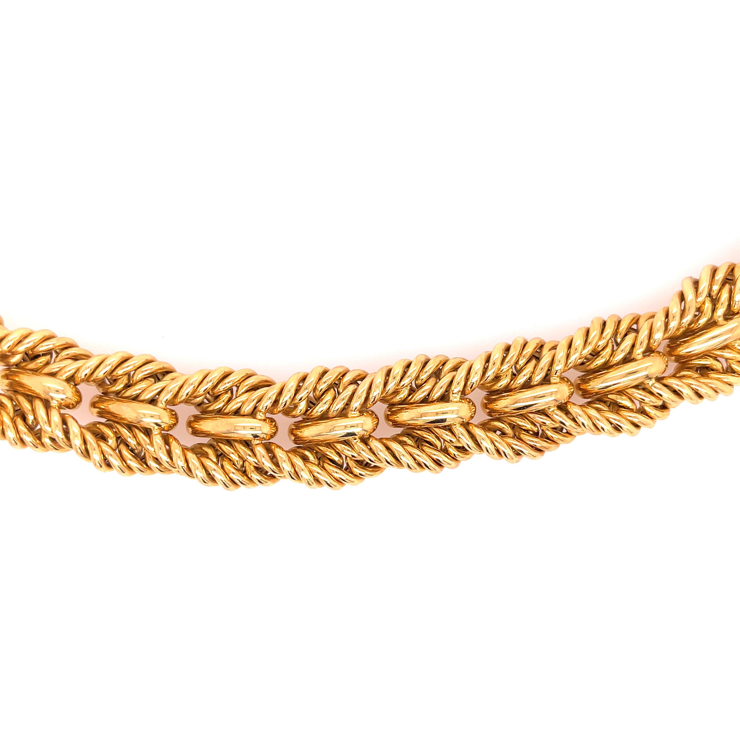 Tiffany & Co. heavy braided collar necklace in 18k yellow gold. Stamped 750 Tiffany & Co.

138 grams

0.65