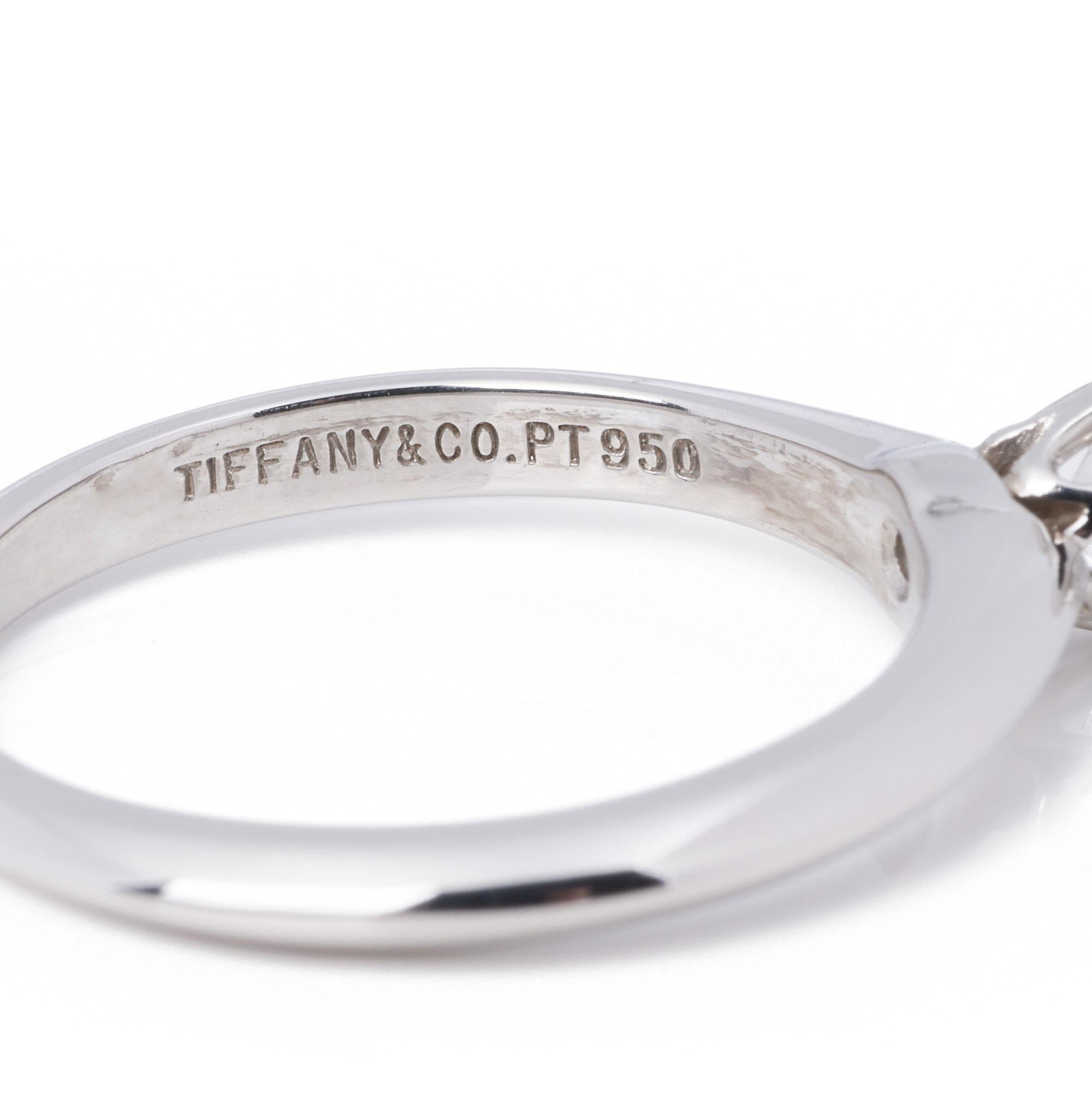 This ring by Tiffany & Co is from their engagement collections and features a solitaire brilliant cut 0.22ct G VVS2 diamond in a classic Tiffany 6 prong setting in platinum. UK ring size I. EU ring size 48. US ring size 4 1/4. Comes complete with