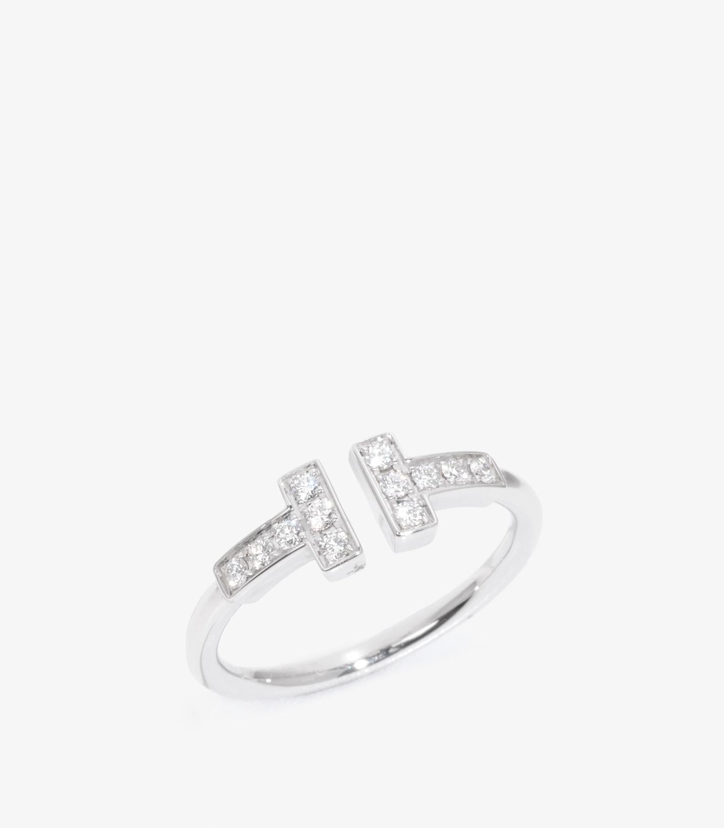 Tiffany & Co. Brilliant Cut Diamond 18ct White Gold T Wire Ring

Brand- Tiffany & Co.
Model- Tiffany T Wire Ring
Product Type- Ring
Accompanied By- Tiffany & Co. Box
Material(s)- 18ct White Gold
Gemstone- Diamond
UK Ring Size- J
EU Ring Size- 49
US