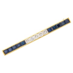 Alfiler broche Tiffany & Co. de oro de 18 quilates con zafiros y diamantes