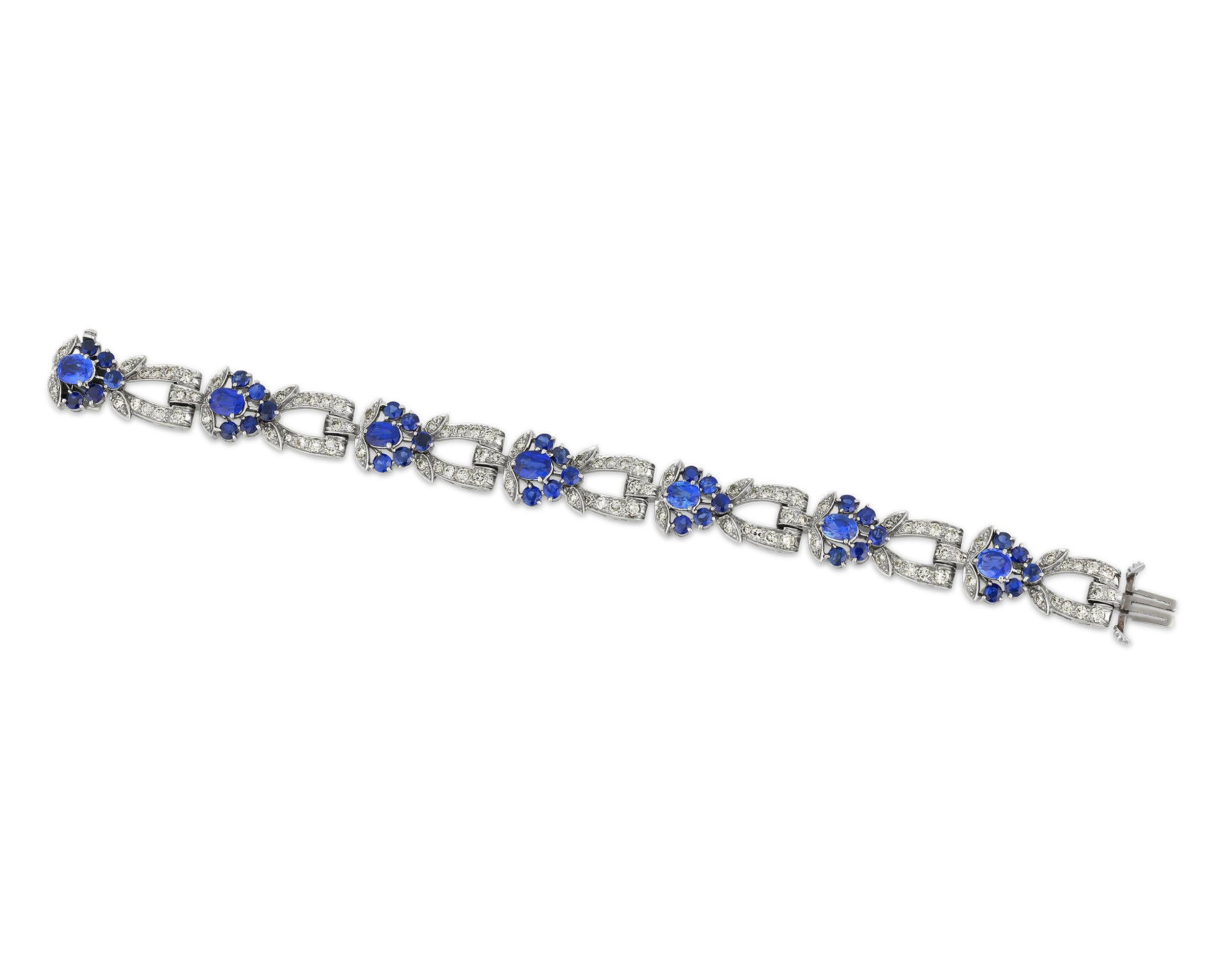 This stunning bracelet from iconic jeweler Tiffany & Co. features dazzling blue oval mixed-cut sapphires totaling 7.90 carats. The beautiful blue sapphires are certified by the American Gemological Laboratories as being of the coveted Burmese