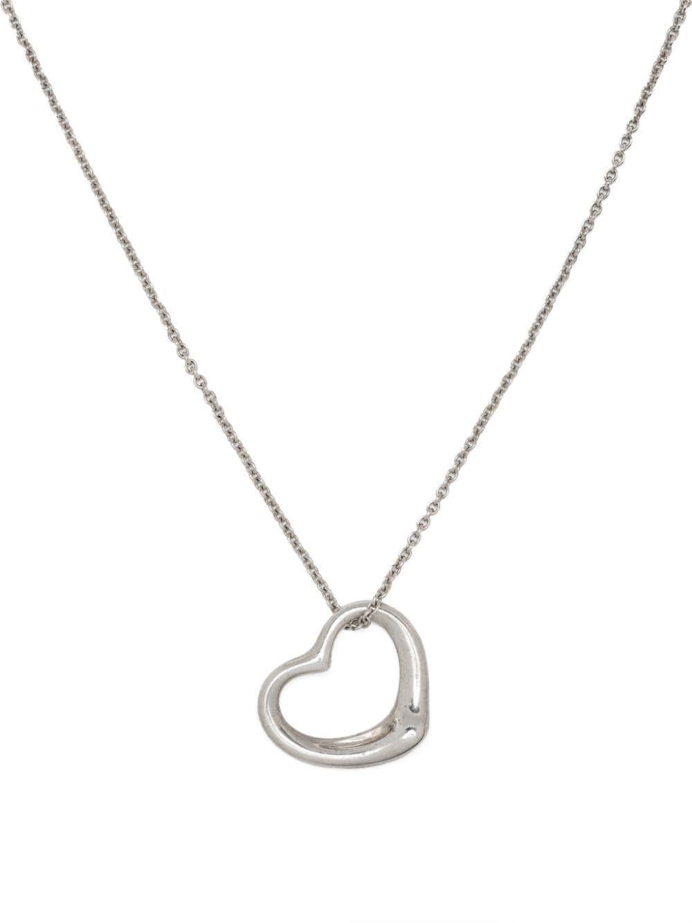 Tiffany & co x Elsa Perreti silver sterling Open Heart-pendant necklace featuring polished finish, heart pendant, engraved logo, cable-link chain, spring-ring fastening. 
Length 16.1in (41 cm)
Pendant Length 0.8in ( 2.1cm)
Circa: 1980s
In good
