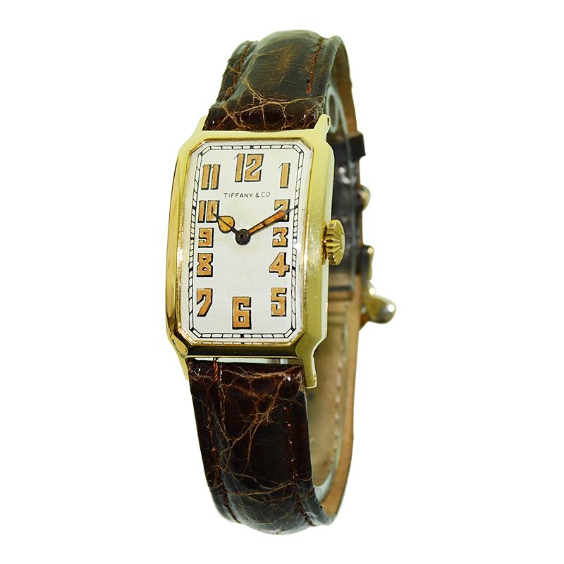 FACTORY / HOUSE: I.W.C. for Tiffany & Co.
STYLE / REFERENCE: Art Deco / Curvex
METAL / MATERIAL: 18kt. Yellow Gold
CIRCA / YEAR: 1930's
DIMENSIONS / SIZE: 38mm X 22mm
MOVEMENT / CALIBER: Manual Winding / 17 Jewels 
DIAL / HANDS: Original Silvered