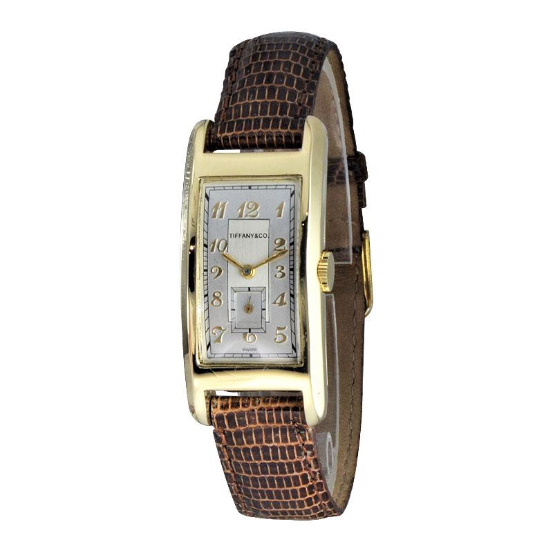 FACTORY / HOUSE: Movado for Tiffany & Co.
STYLE / REFERENCE: Art Deco / Curvex Style
METAL / MATERIAL: 14kt Solid Gold
CIRCA / YEAR: 1930's
DIMENSIONS / SIZE: 43mm x 20mm
MOVEMENT / CALIBER: Manual Winding / 17 Jewels / Cal. C440 
DIAL / HANDS: