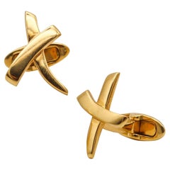 TIFFANY & CO. Paire de boutons de manchette graffiti en or jaune 18 carats par Paloma Picasso