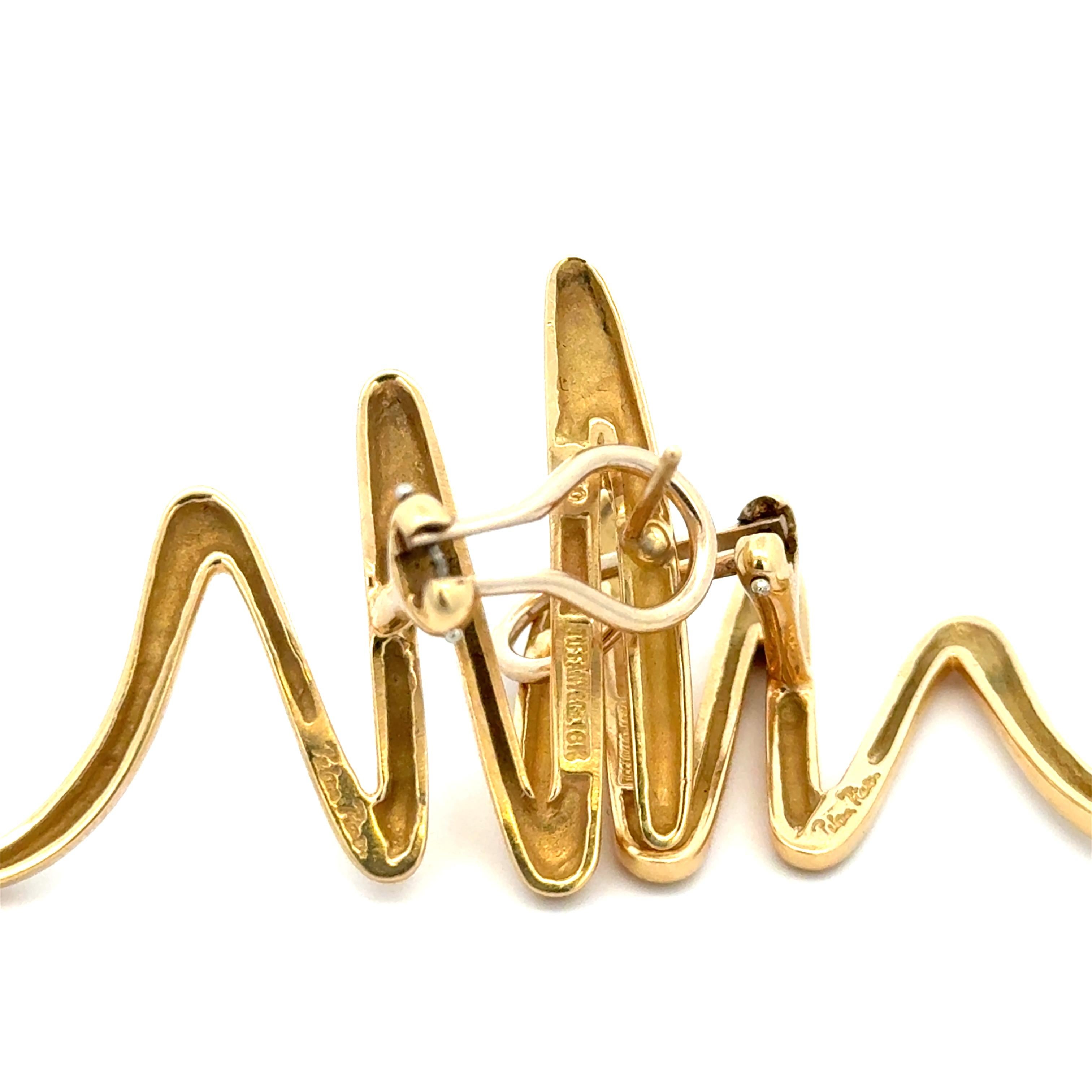 Tiffany & Co. by Paloma Picasso Swirl Earrings in 18K Yellow Gold. The earrings measure approximately 1.75