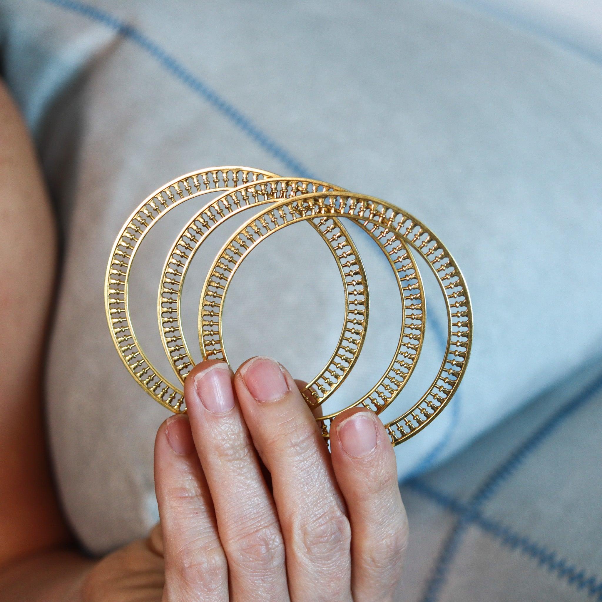 Venezia Stella bangles designed by Paloma Picasso for Tiffany & Co.

This is a beautiful and extremely rare trio of bangles, created at the Tiffany & Co. Studios in New York City by Paloma Picasso. This trio of bangles are part of the collection