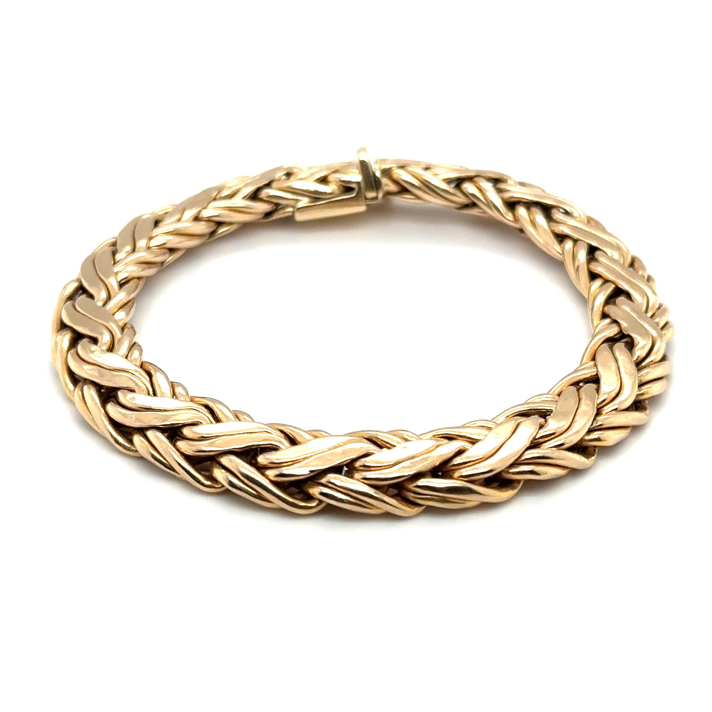 Item Details: This beautiful vintage bracelet has a woven Byzantine style chain design and is stamped with Tiffany & Co's maker mark. Crafted in 14 Karat Yellow Gold, it is a stunning bracelet, dating back to the 1980s! 

Circa: 1980s
Metal Type: 14