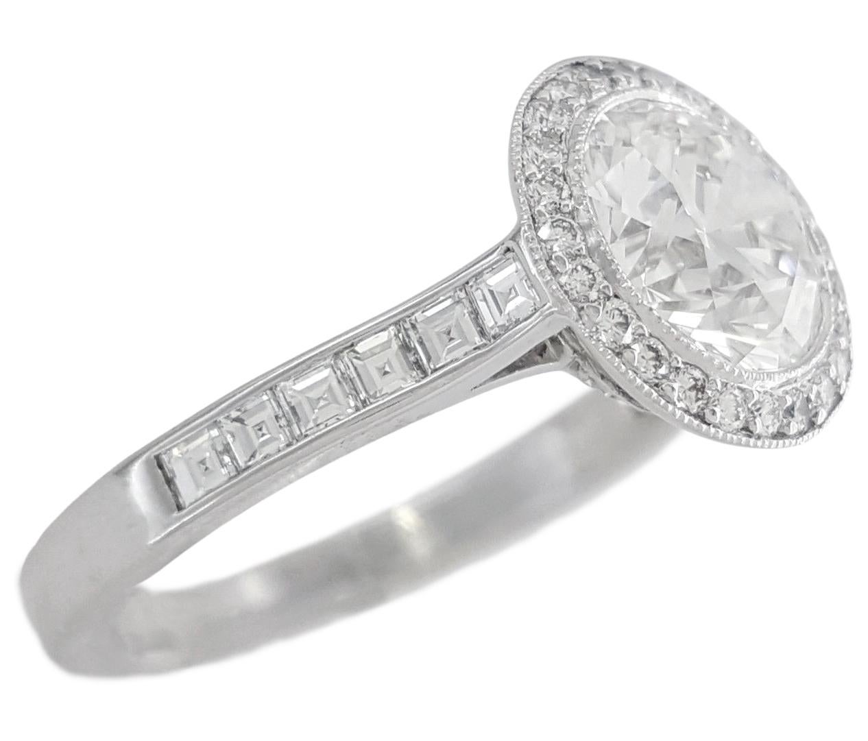 Tiffany & Co. Platinum Soleste® 1.20 carat Round Diamond Halo Engagement Ring.
