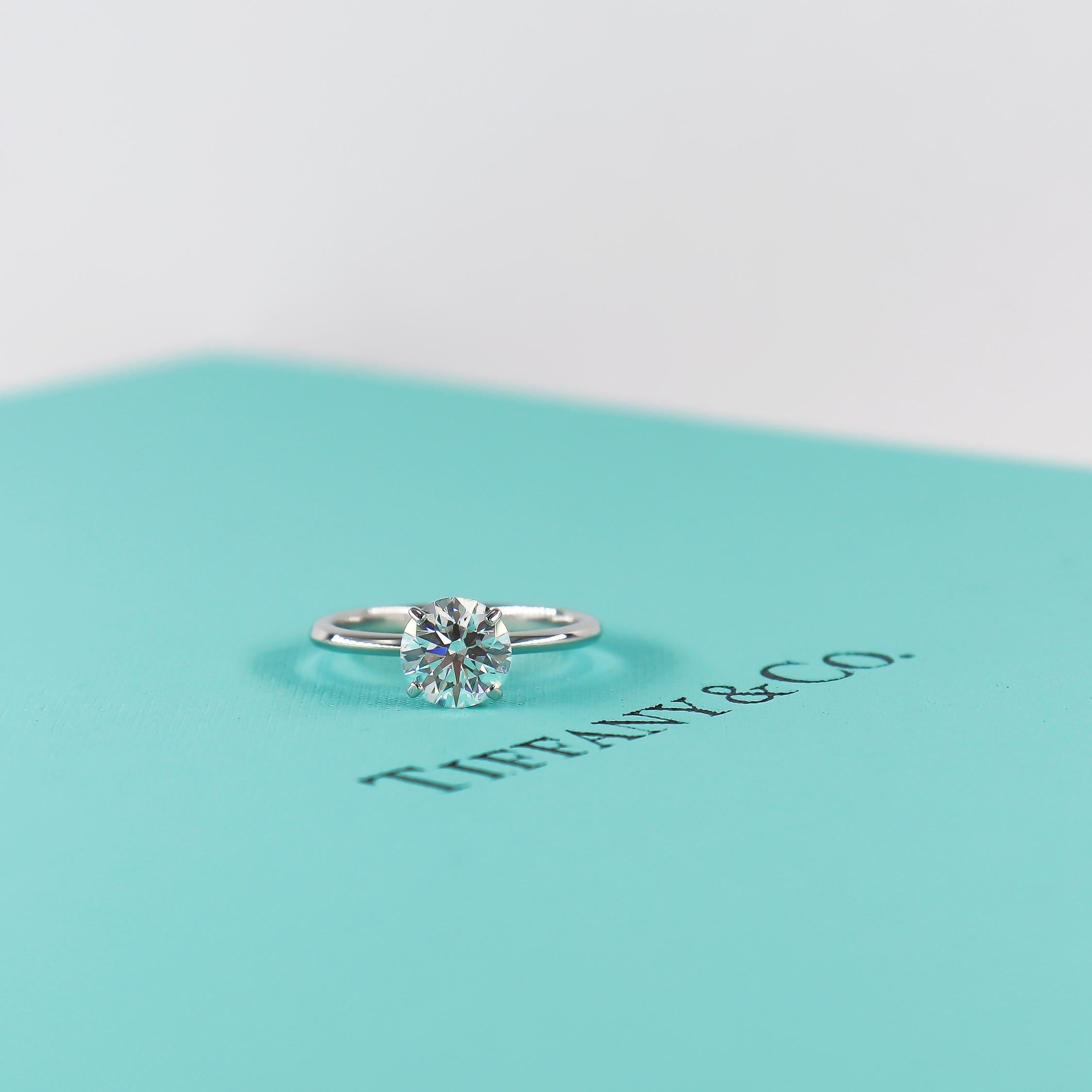 Nothing says classic romance like a Tiffany & Co engagement ring! This stunning solitaire is Tiffany's latest engagement ring design, the Tiffany True. Introduced in 2018, the Tiffany True solitaire has a delicate platinum band and the diamond is