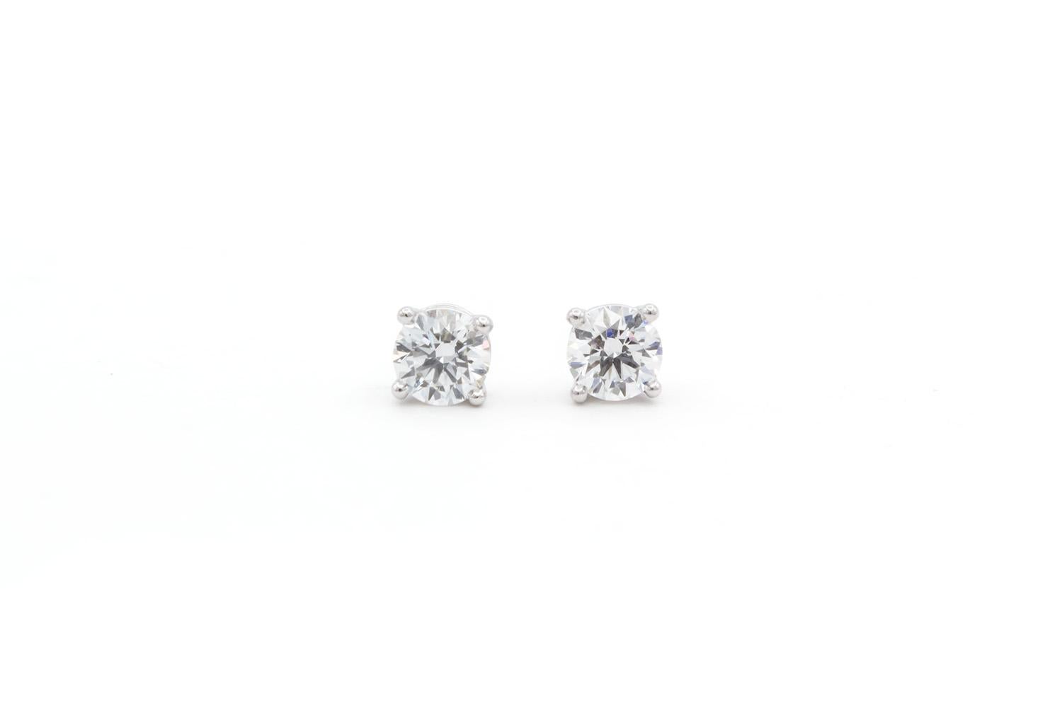 Round Cut Tiffany & Co. Certified Platinum & Round Diamond Stud Earrings 0.66ctw F/VVS2