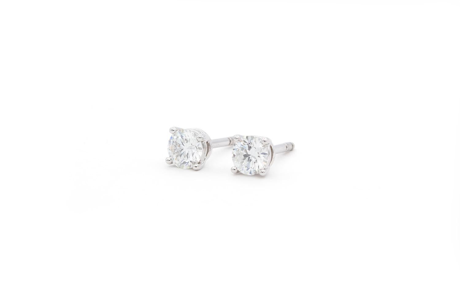 Tiffany & Co. Certified Platinum & Round Diamond Stud Earrings 0.66ctw F/VVS2 In Excellent Condition In Tustin, CA