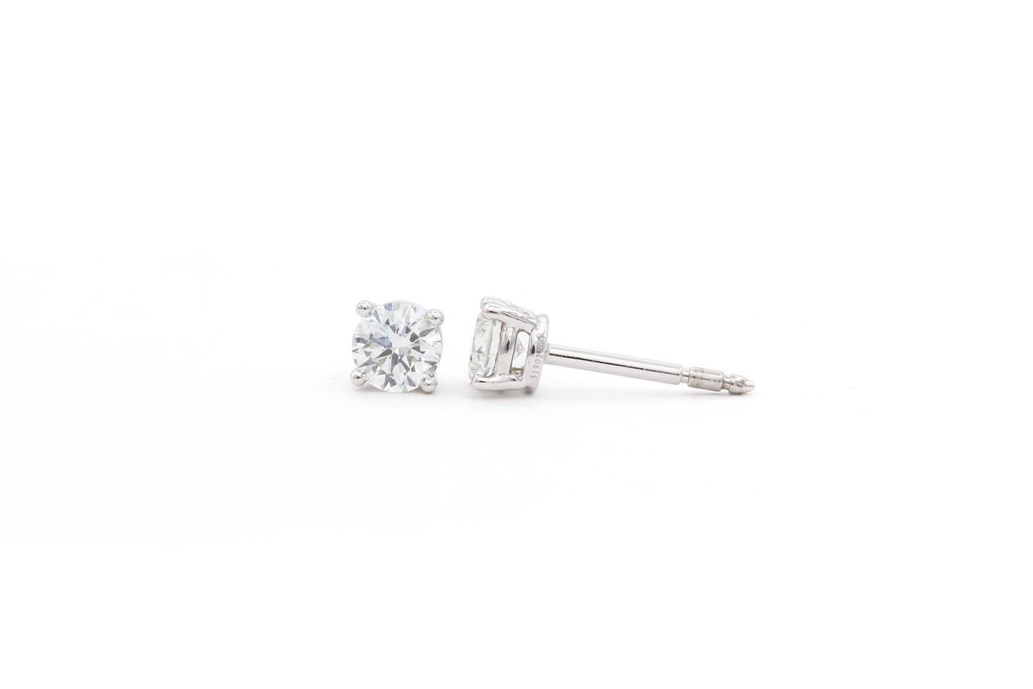 Women's Tiffany & Co. Certified Platinum & Round Diamond Stud Earrings 0.66ctw F/VVS2