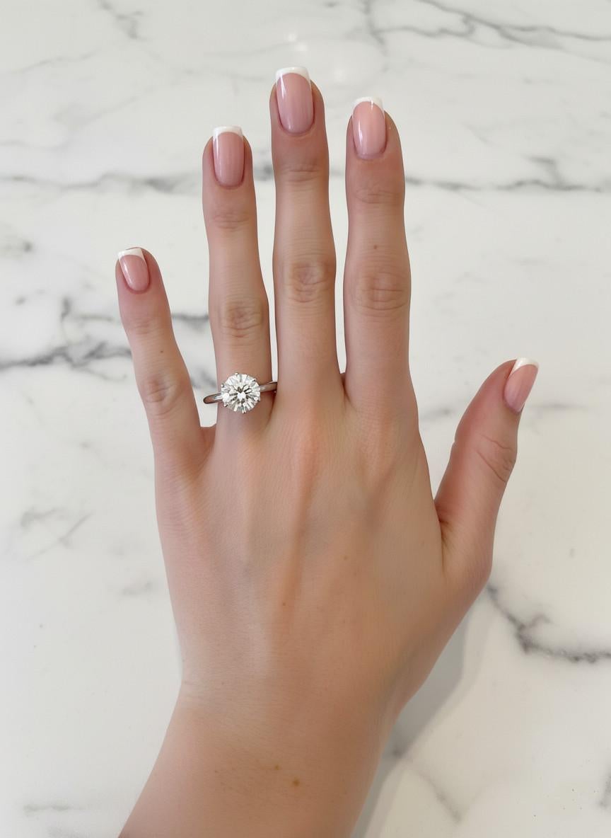 Taille ronde Tiffany & Co. Bague solitaire en platine certifié avec diamant rond brillant en vente