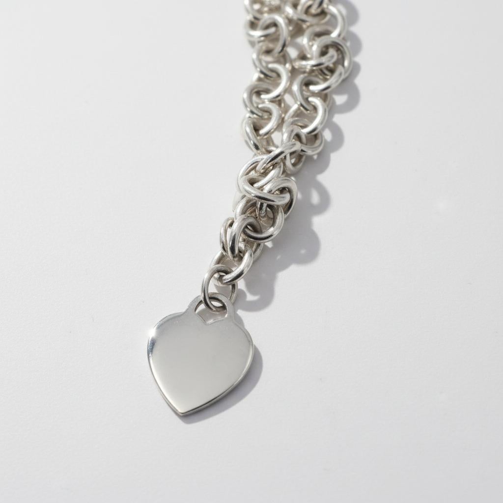 Tiffany & Co. Pulsera de cadena con dije de corazón en plata de ley en venta 2