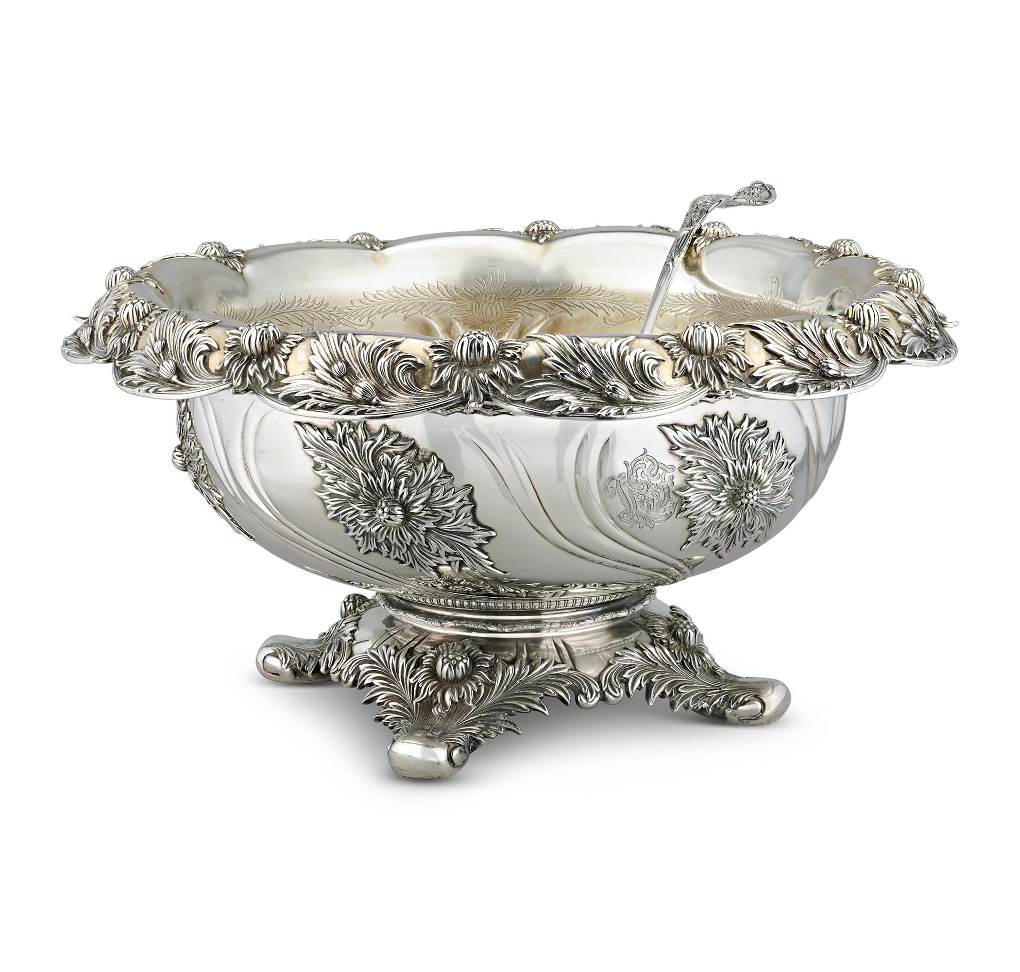 This exceptional silver punchbowl and ladle from Tiffany & Co. are crafted in the iconic Chrysanthemum pattern, one of the most beloved sterling patterns ever made. Because of its intricacy, the pattern was among the most expensive motifs produced