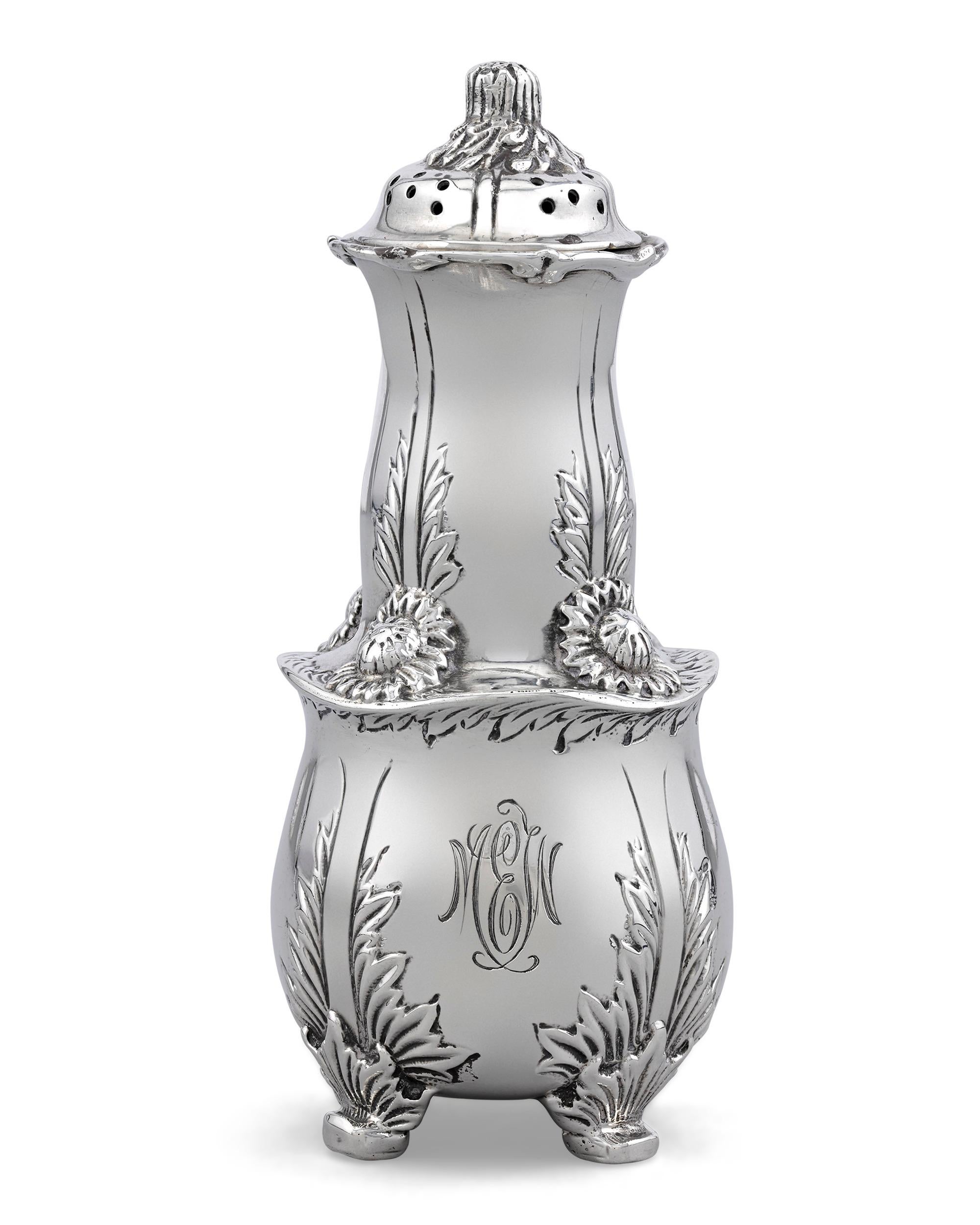 This fine set of four Tiffany & Co. sterling silver salt and pepper shakers feature the coveted Chrysanthemum pattern. Introduced in 1878 and patented in 1880 (patent no. 11968), Chrysanthemum was the work of Charles T. Grosjean, one of the most