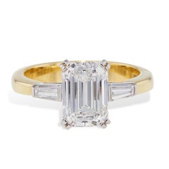 Tiffany & Co. circa 1990 Yellow Gold and Platinum Emerald Cut Diamond Ring
